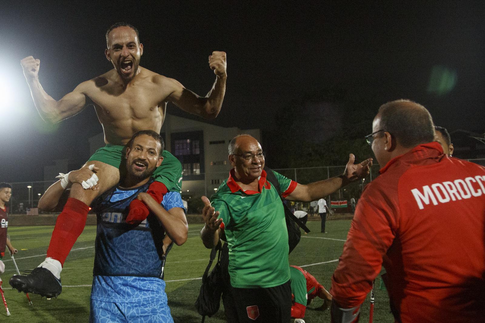 Image from First African Para Games  - A Moroccan amputee football player celebrates after a win...