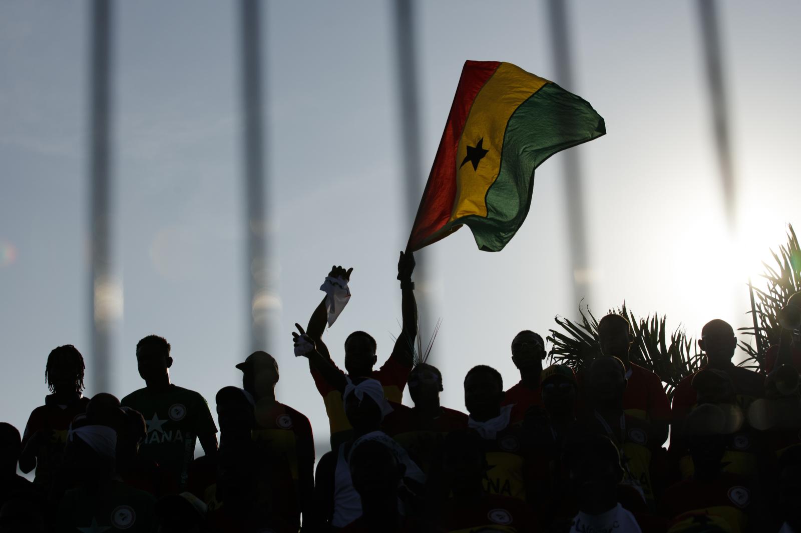 Image from First African Para Games  - A fan cheers with a Ghana flag during the final game...
