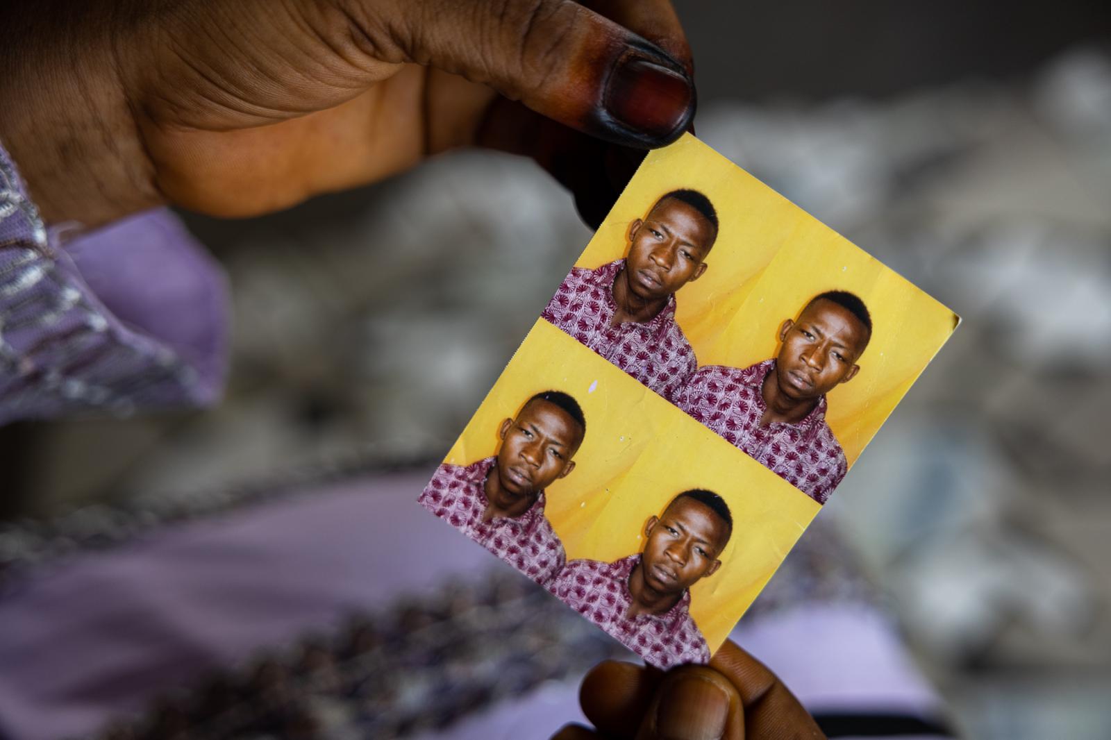 In Guinea’s capital, a heartbroken family brings their son’s body home