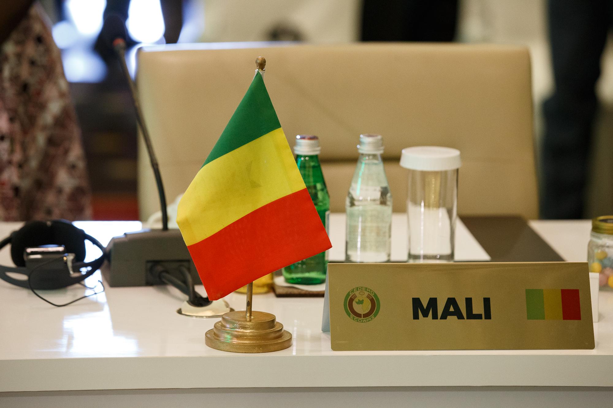 West African leaders make demands after coups in the region - The seat of the representative of Mali stands empty during the fifth extraordinary summit in...