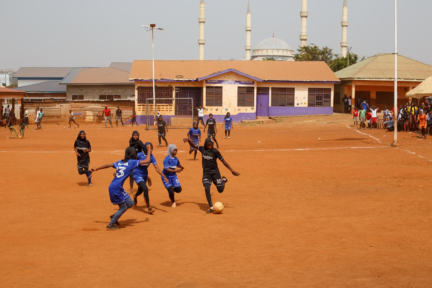 Image from Faith and Football - Girls play football in their Hijabs during the 'hijab...