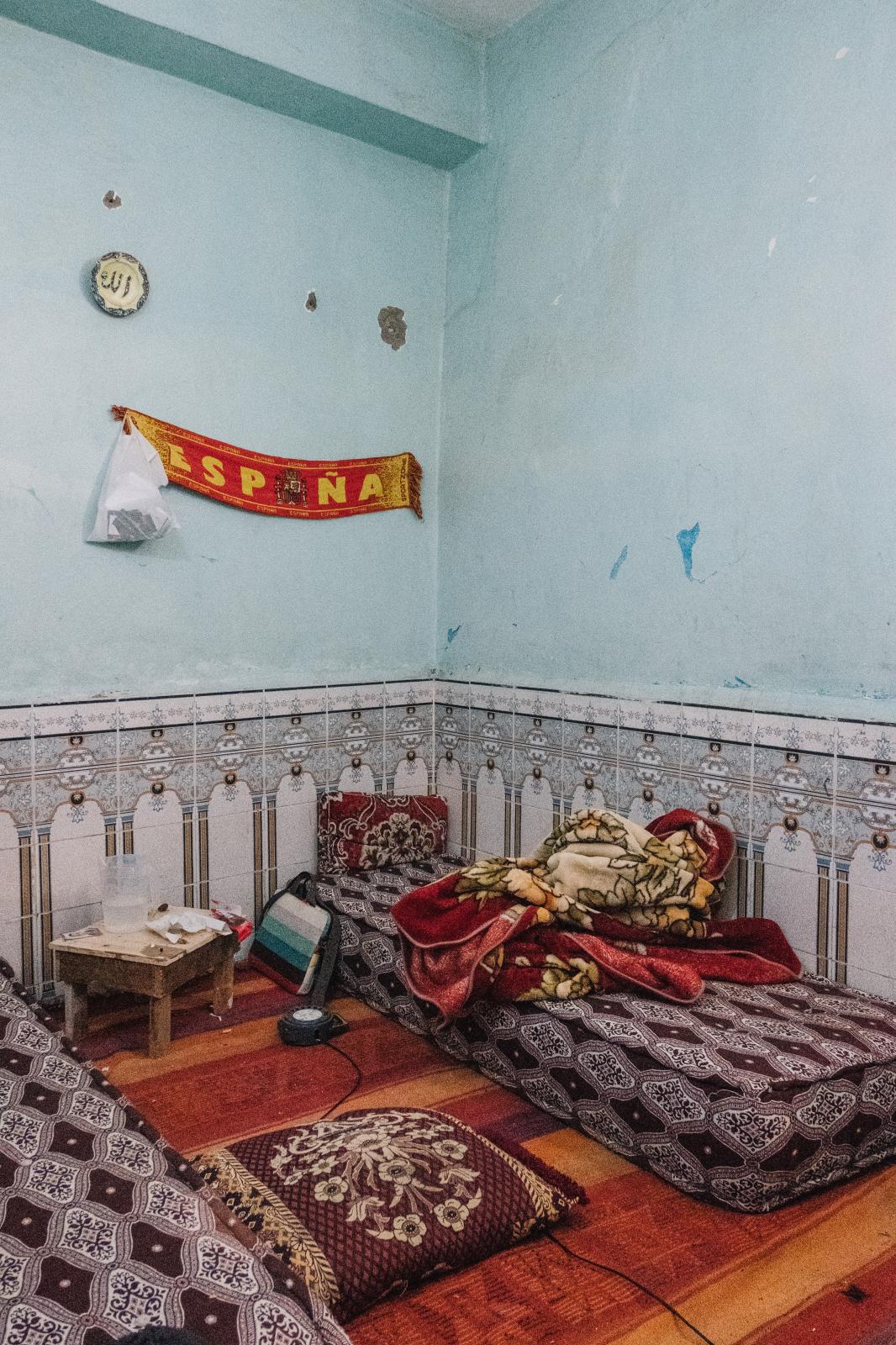 Rural youth  - Slama's brother's room with a banner with...