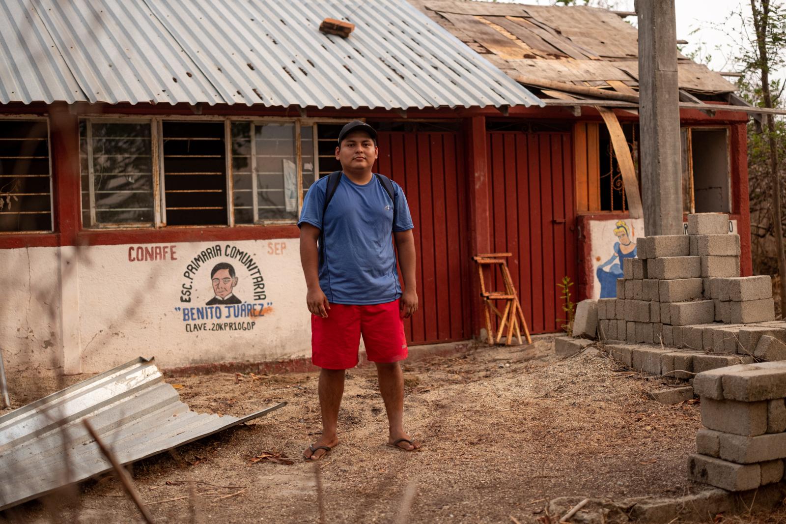 La Ventanilla: A window to coexisting with Crocodiles  - Ignacio Martinez stands in front of his primary school. He was part of the last generation to...