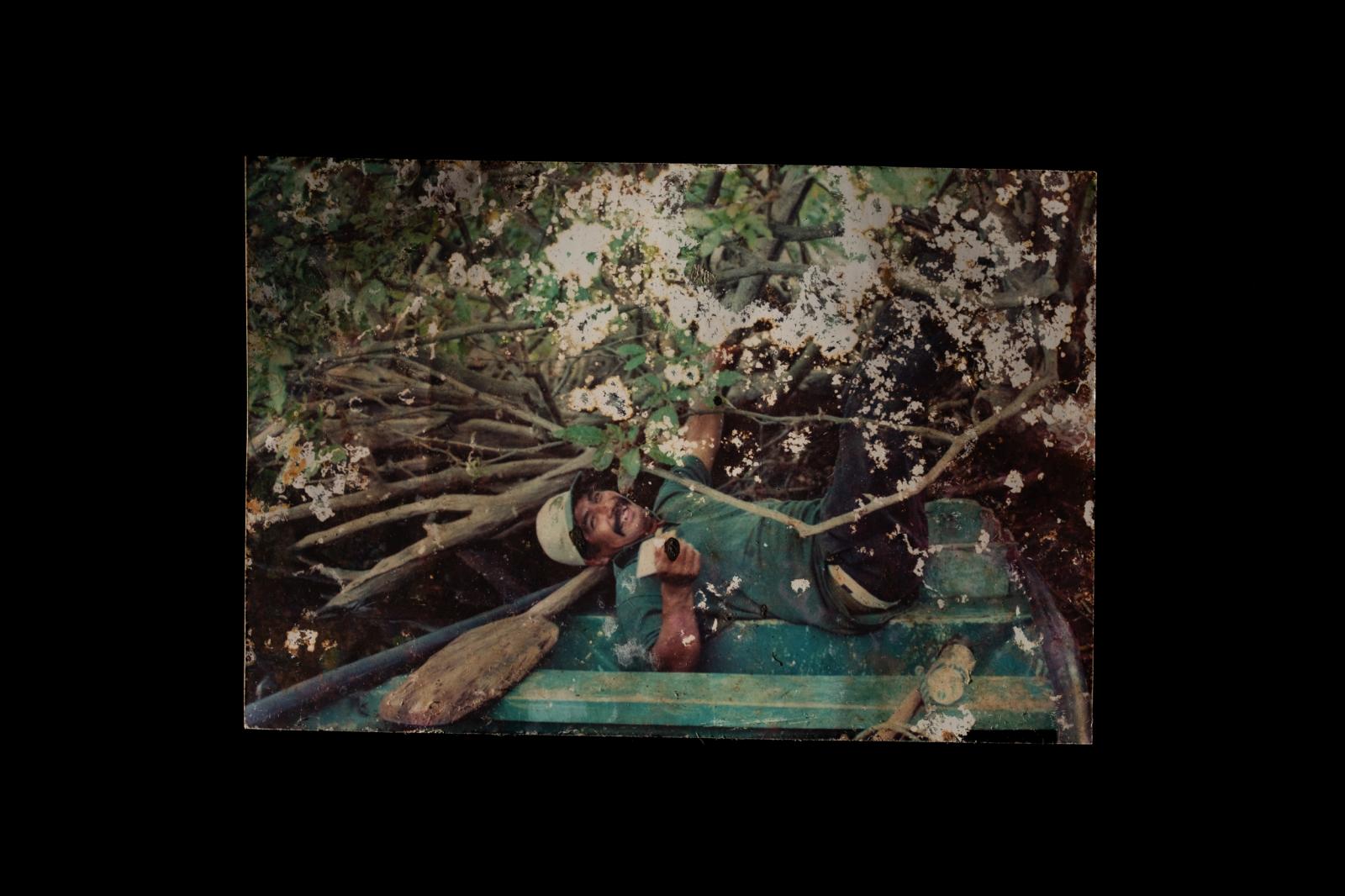 La Ventanilla: A window to coexisting with Crocodiles  - Bonifacio Cortez hungs on the mangroves of La Ventanilla,  From Bonifacios archives, unknown date
