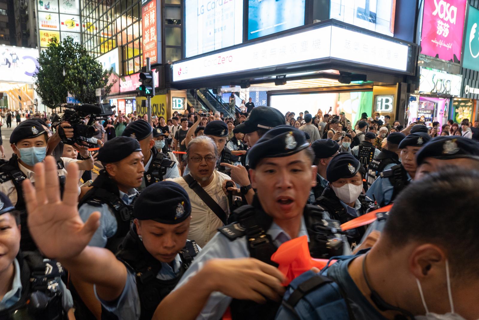 Police arrest performance artis... YAN ZHAO/AFP via Getty Images)