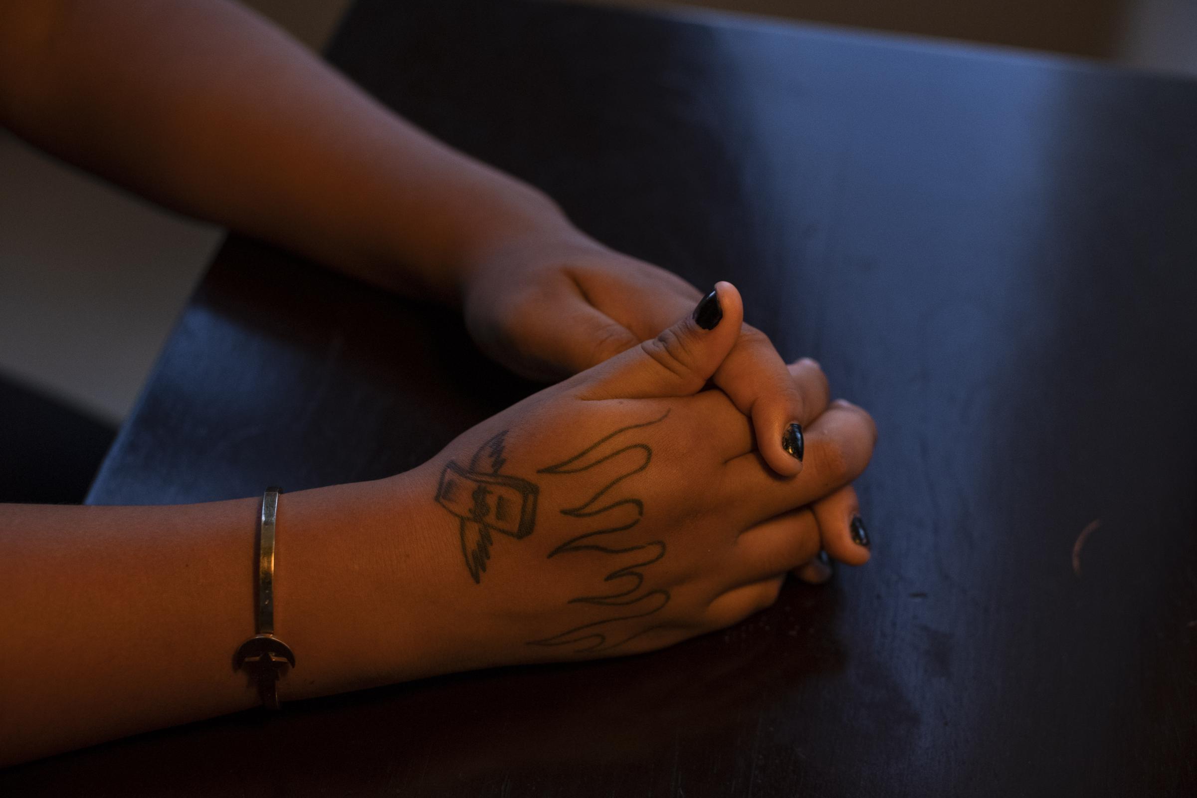 Paradise lost: Inside Peru's emergency zone for NBC News - Detail of the tattoos on Celine&#39;s hand, a victim of trafficking and forced prostitution...