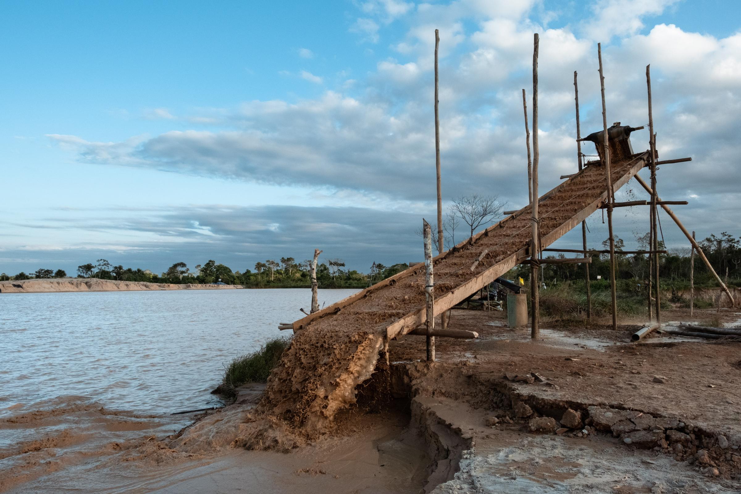 Illegal Gold Mining in La Pampa - The mining camp on the Inter-Oceanic Highway South,...