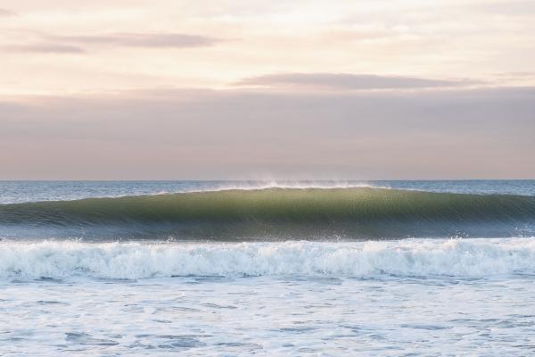 Rockaway Beach - 13 Feb. 2023. Rockaway Beach, NY. An empty breaking wave...