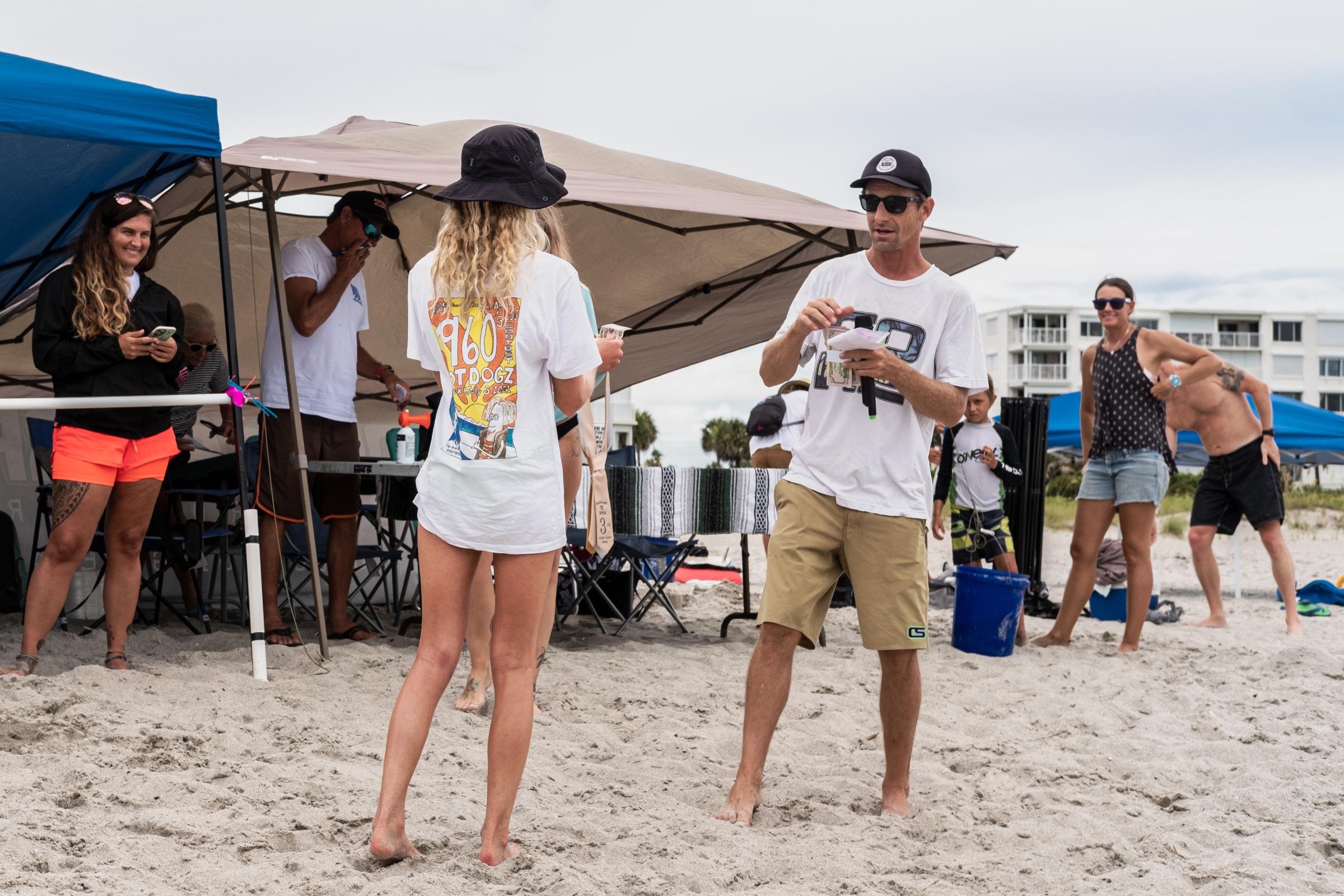 Cape Canaveral, FL. Hotdogzonastix Surf Contest July 2021 -  Sarah Stotz (L) and Dennis Griffin (R) at the Third...