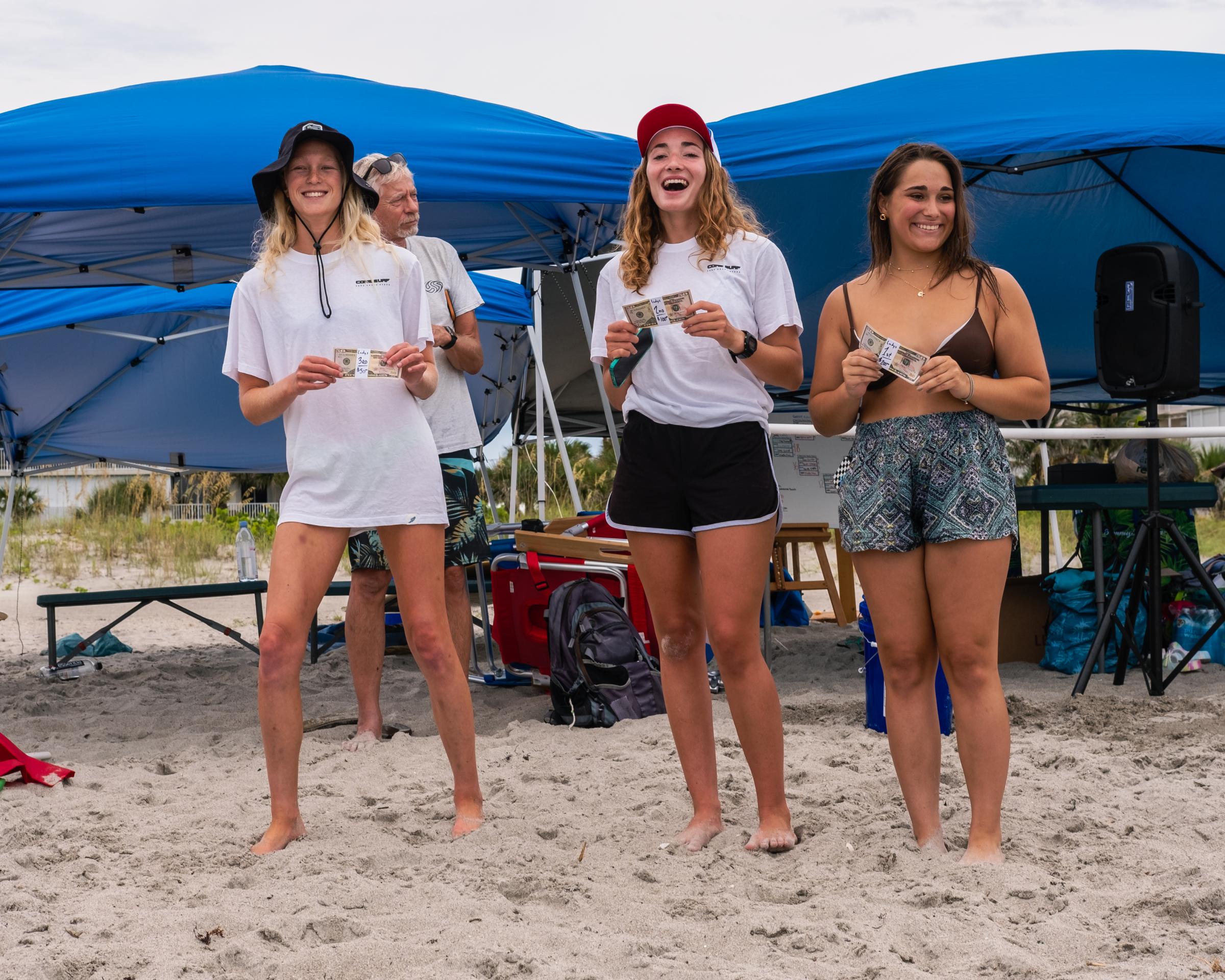 Cape Canaveral, FL. Hotdogzonastix Surf Contest July 2021 -  (L-R) Sarah Stotz 3rd place, Kaylin Weinrich 2nd place,...