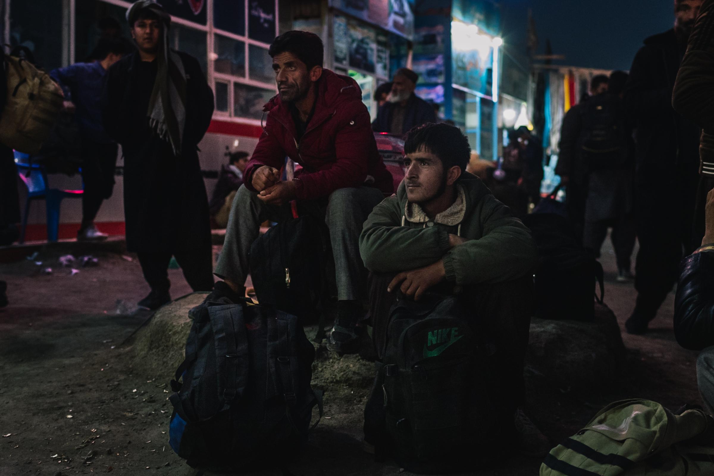Afghan refugees at the bus terminal in Zarandj.