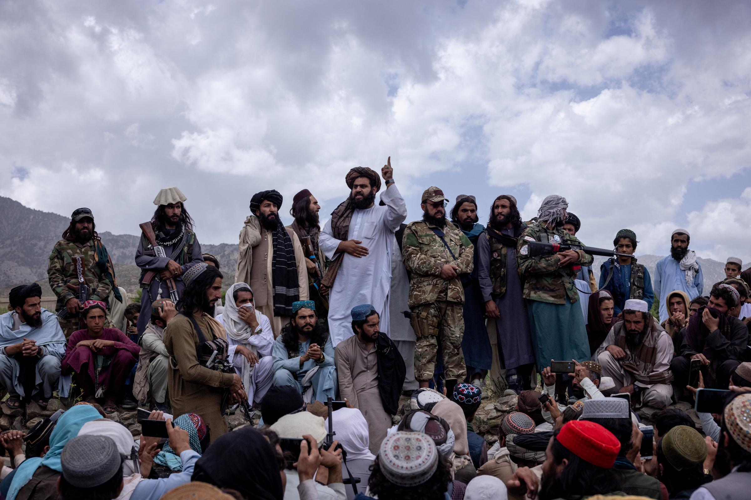 A shattered country - A Taliban commander gives a speech for the victims of an...