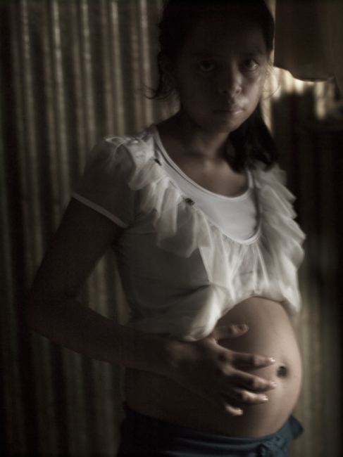 Image from Children having Children -  Gloria, who just turned 13, barely understands what...