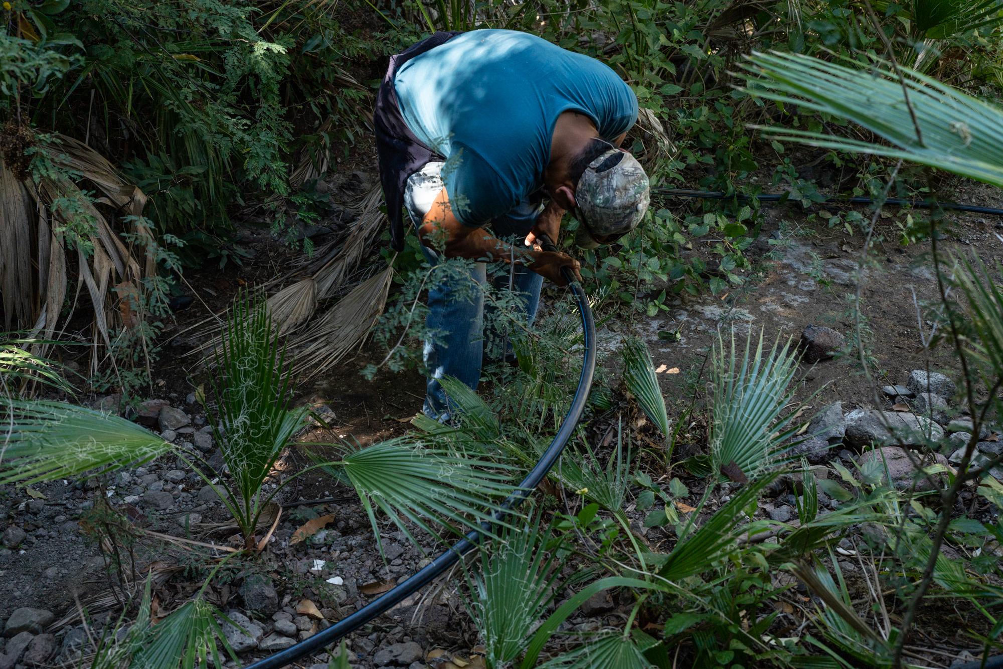Until We Are Gone  - Enrique fixes a leaking hose that is used to transport...