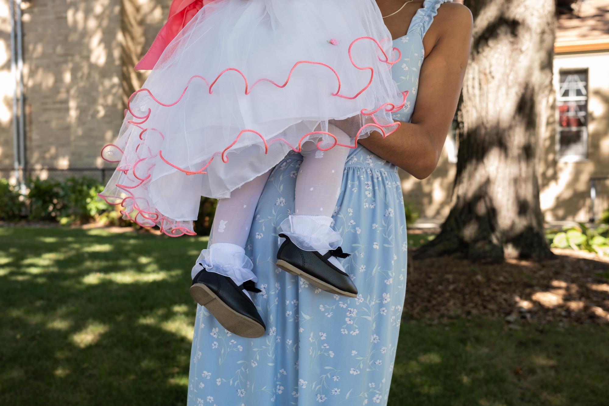 ProPublica - Immigration  - Esmelia, 27, from Nicaragua, holds her daughter before...