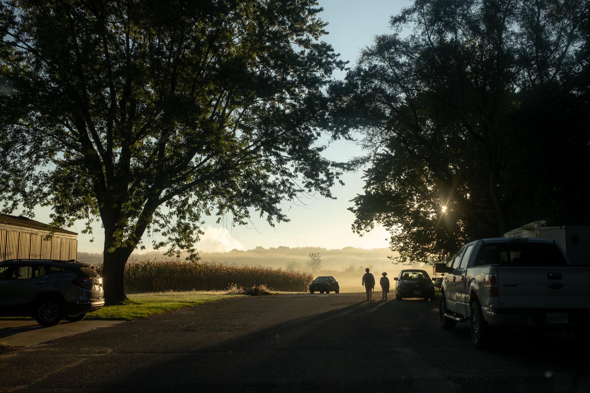 ProPublica - Immigration  - Kids walk to catch their school bus in Twin Oaks Mobile...
