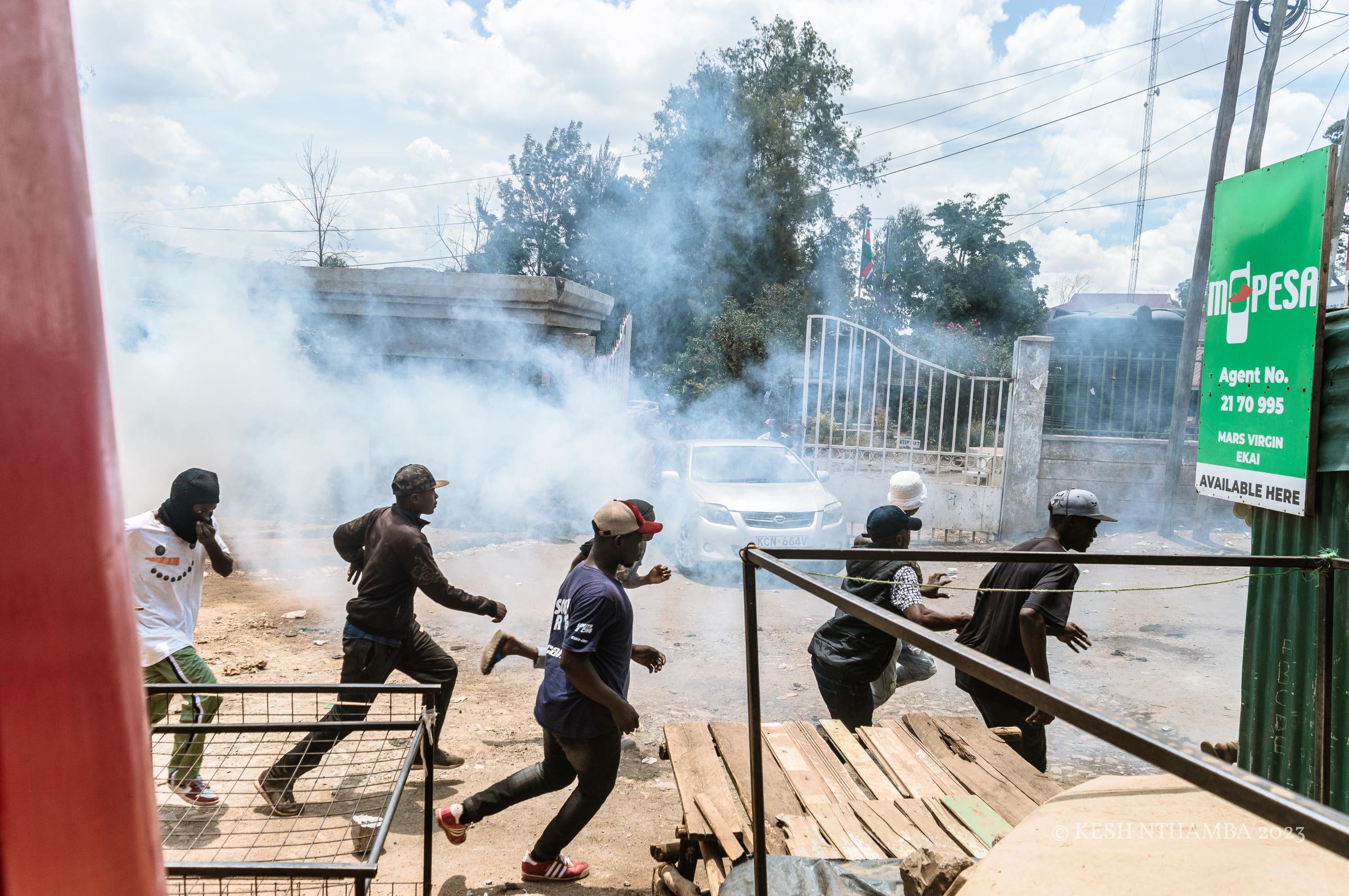 Anti-government Kibera Protests - Protestors flee from teargas during the anti-government...