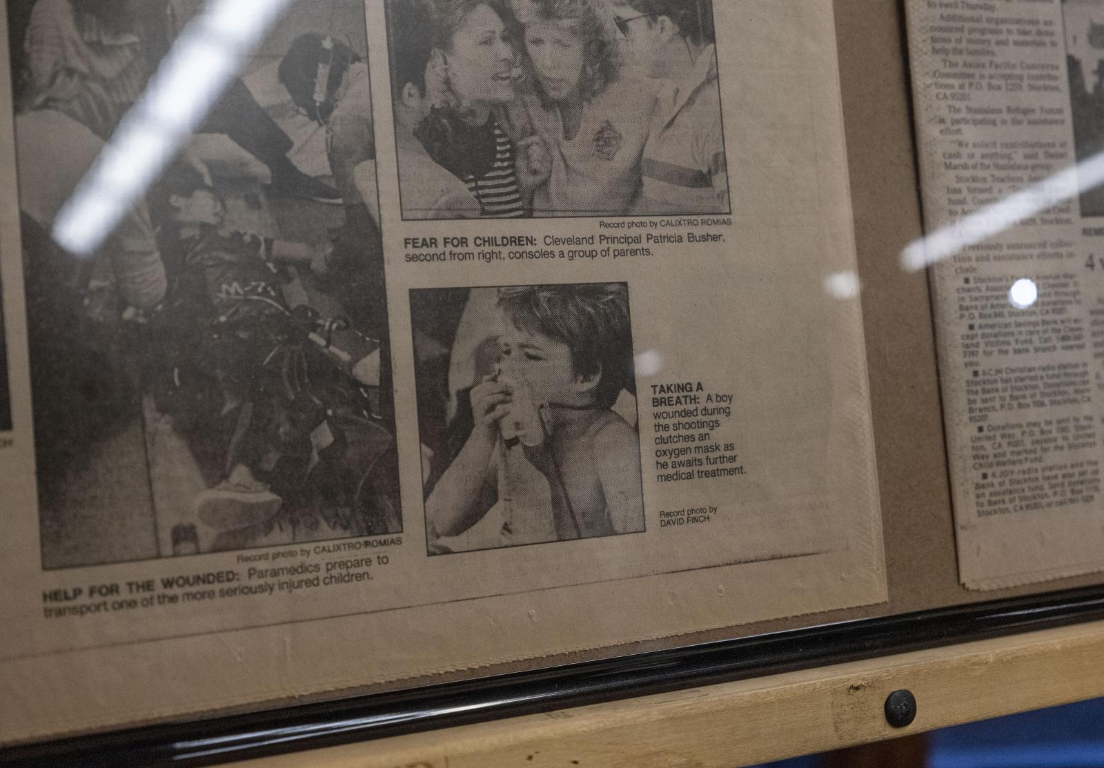 35 years after the Cleveland Elementary School Shooting - A newspaper photo of Rob Young in the aftermath of the shooting displayed during the vigil and...