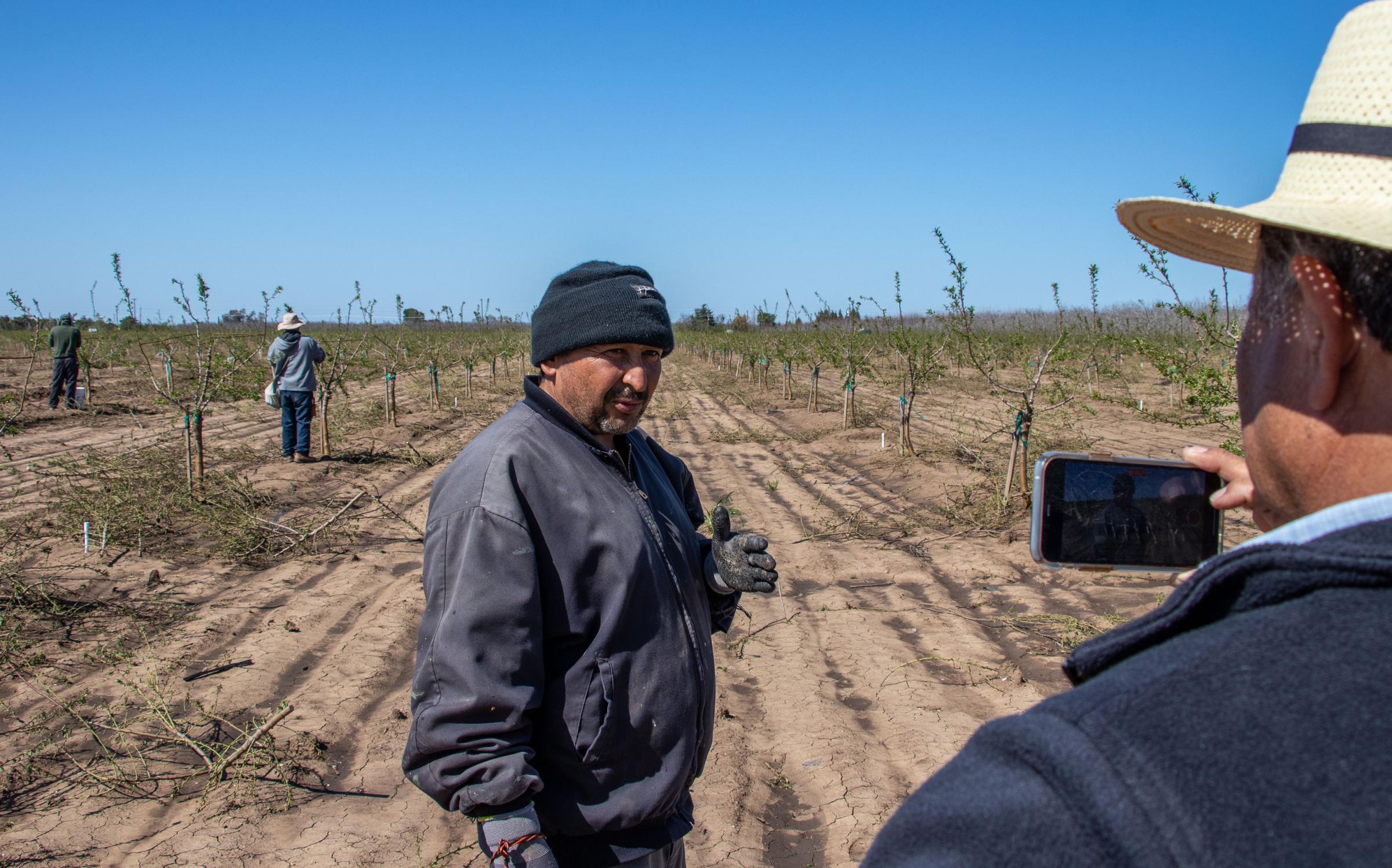 Lack of Translation Services for the Latino Community - Luis Magaña records video of farm worker Julio Garcia...