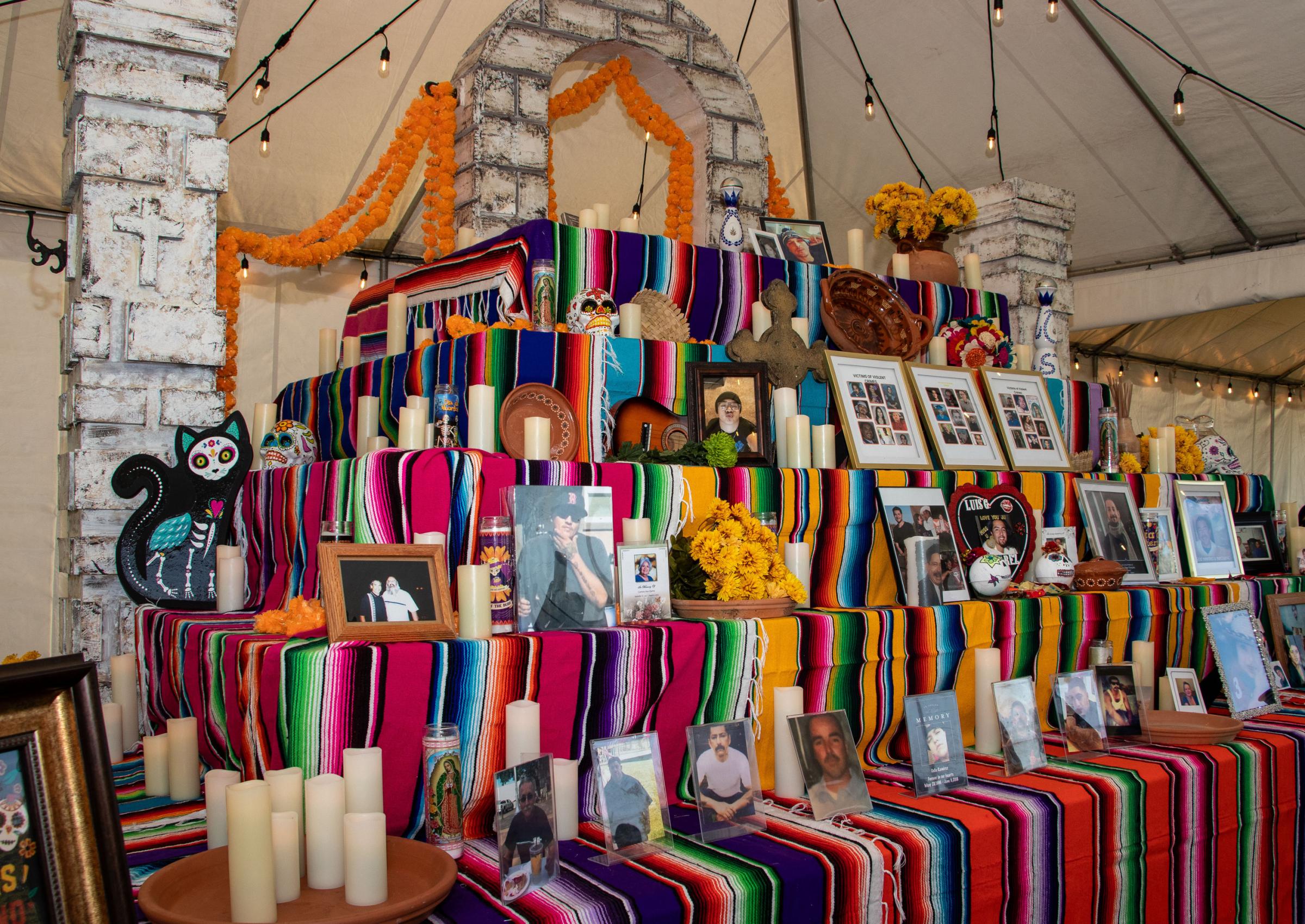 Dia de los Muertos - Photos and belongings of community members who passed...