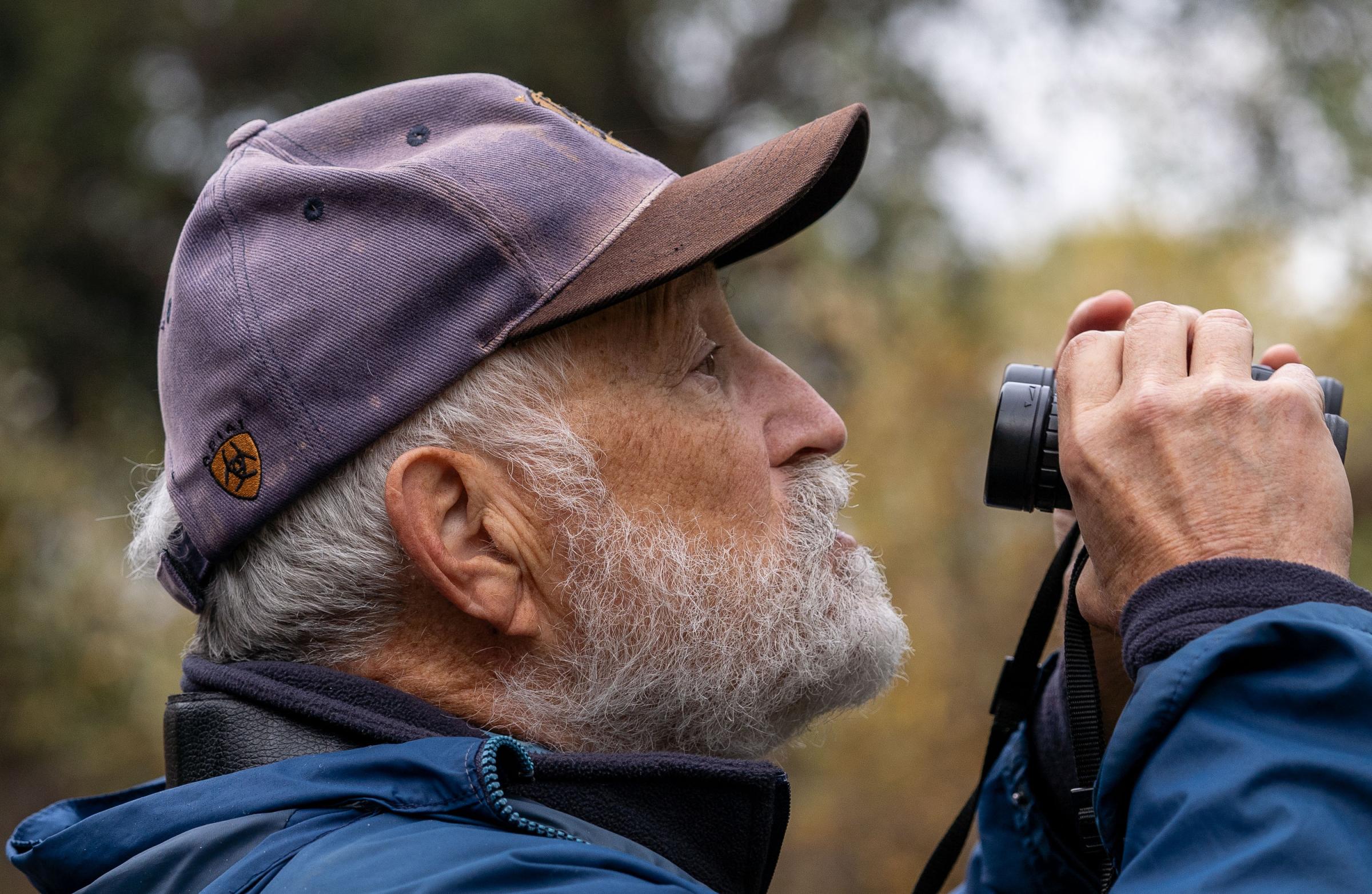 Birders - Howard Higley looks for birds at Lodi Lake in Lodi,...