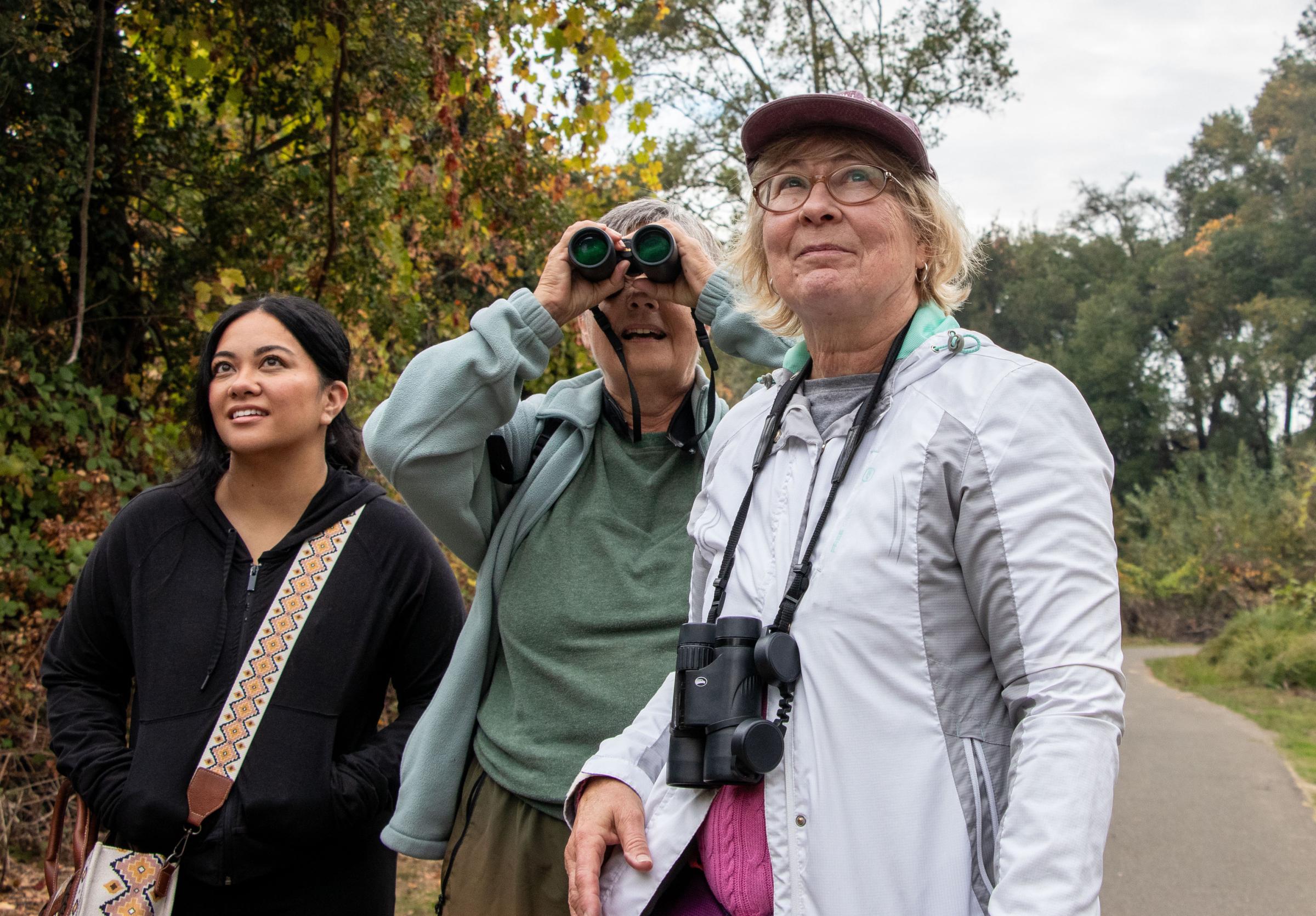 Birders - From left, Jessica Hasal, Inger Coble and Mona Lange spot...