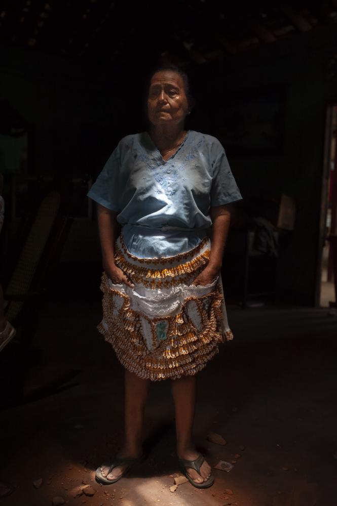 Nicaragua / part two - Your mother to surrender - Portrait of an elderly woman inside her home after a bomb...