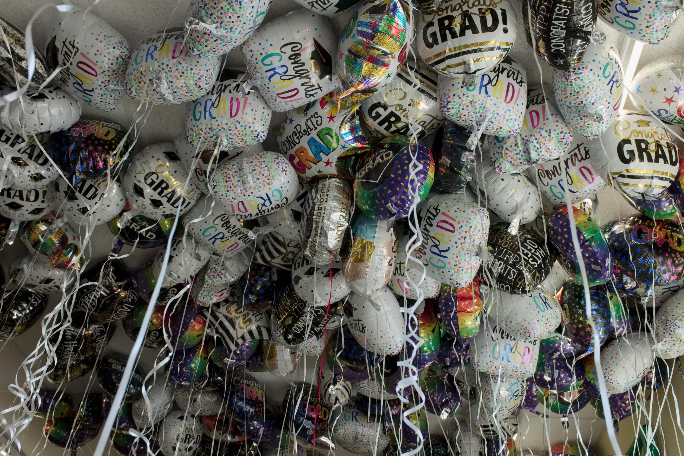 Drewsville & Beyond - Balloons, filled with helium, congratulating graduates,...