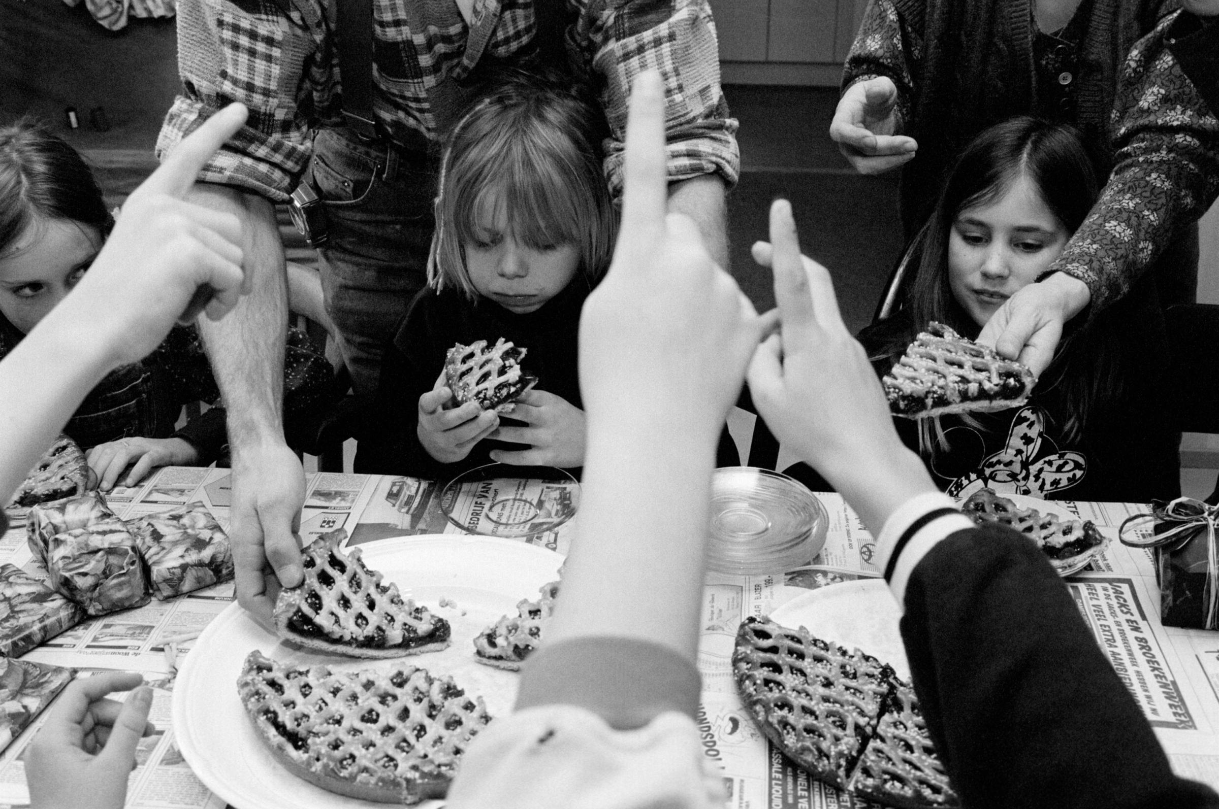 Happy Birthday! Dutch Children’s Parties - Children eat cherry pie at the party of a nine year old...