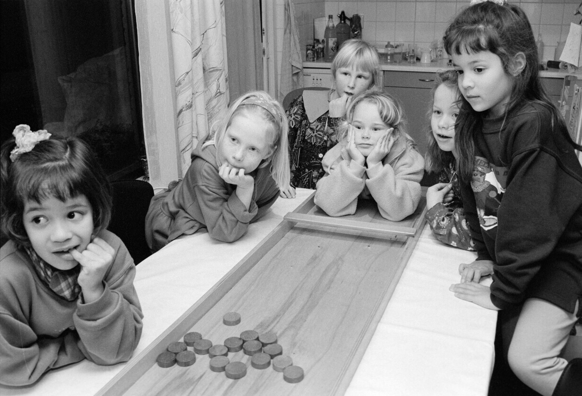 Happy Birthday! Dutch Children’s Parties - Girls wait to hear the score of a game of shuffleboard at...