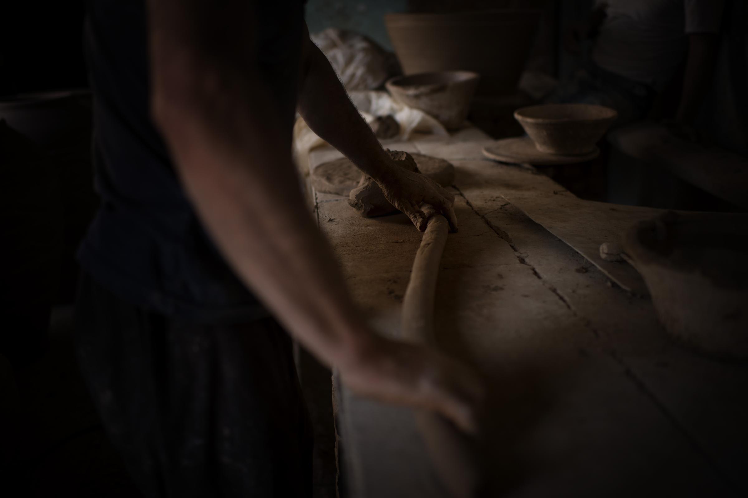 In The Potter's Workshop - 