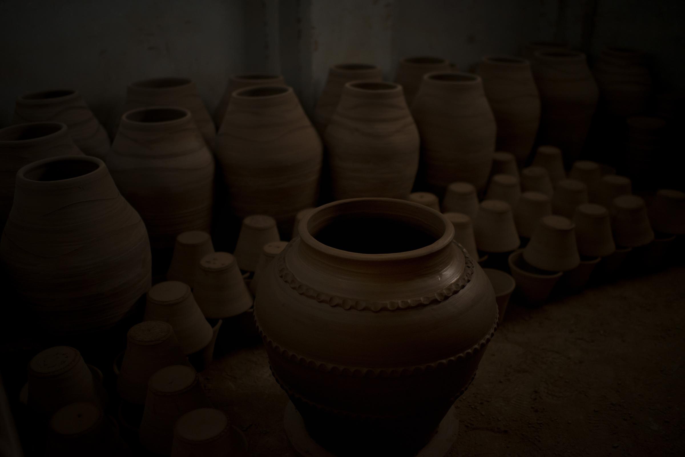 In The Potter's Workshop - 