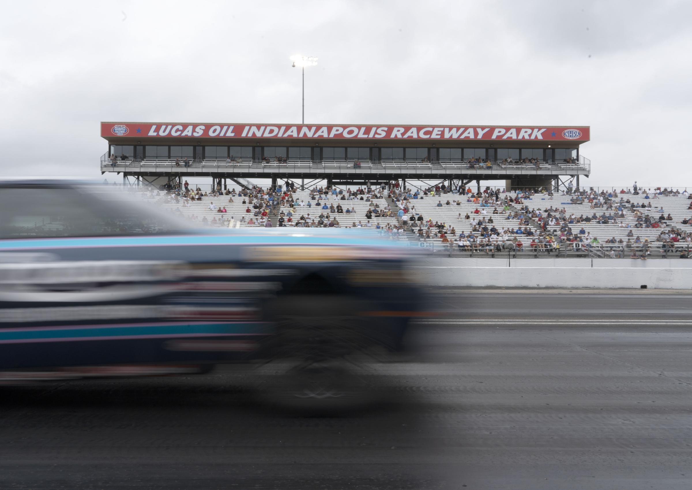 Sports - A car races by during the Dodge Power Brokers US...