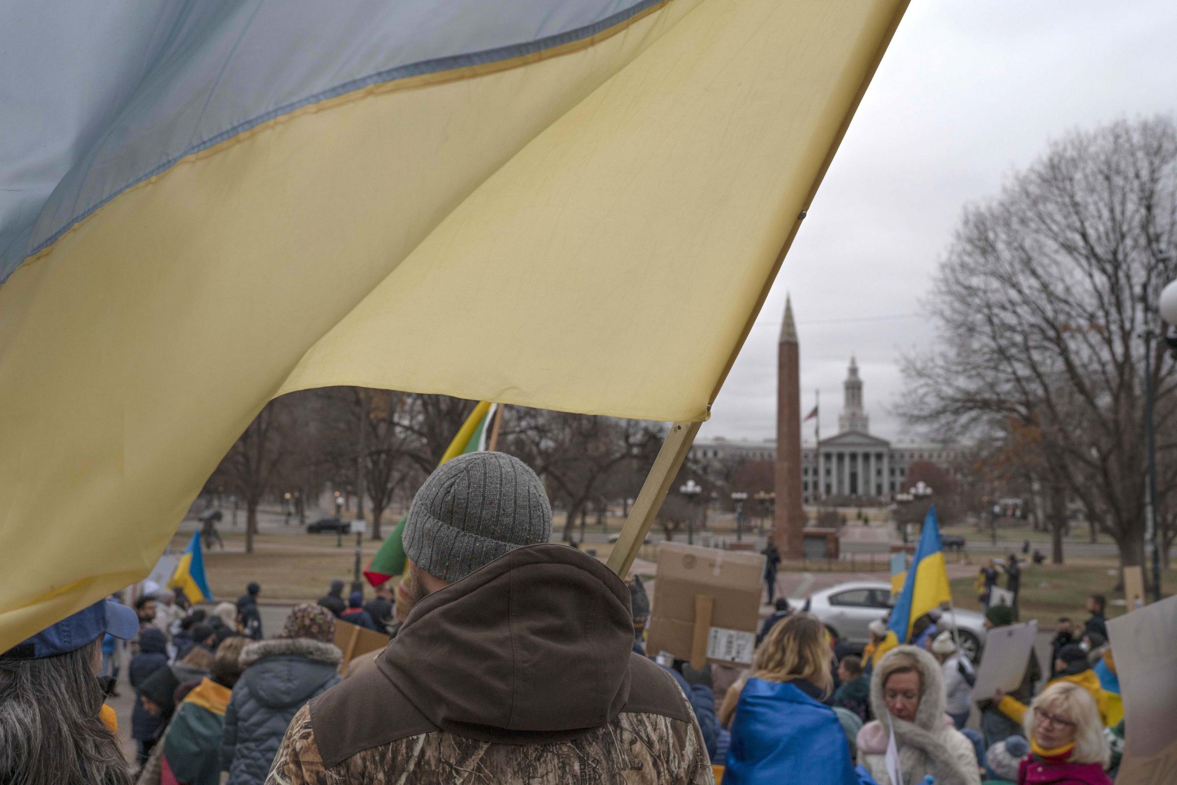 Slava Ukraini - Demonstrators stand in front of the Colorado State...