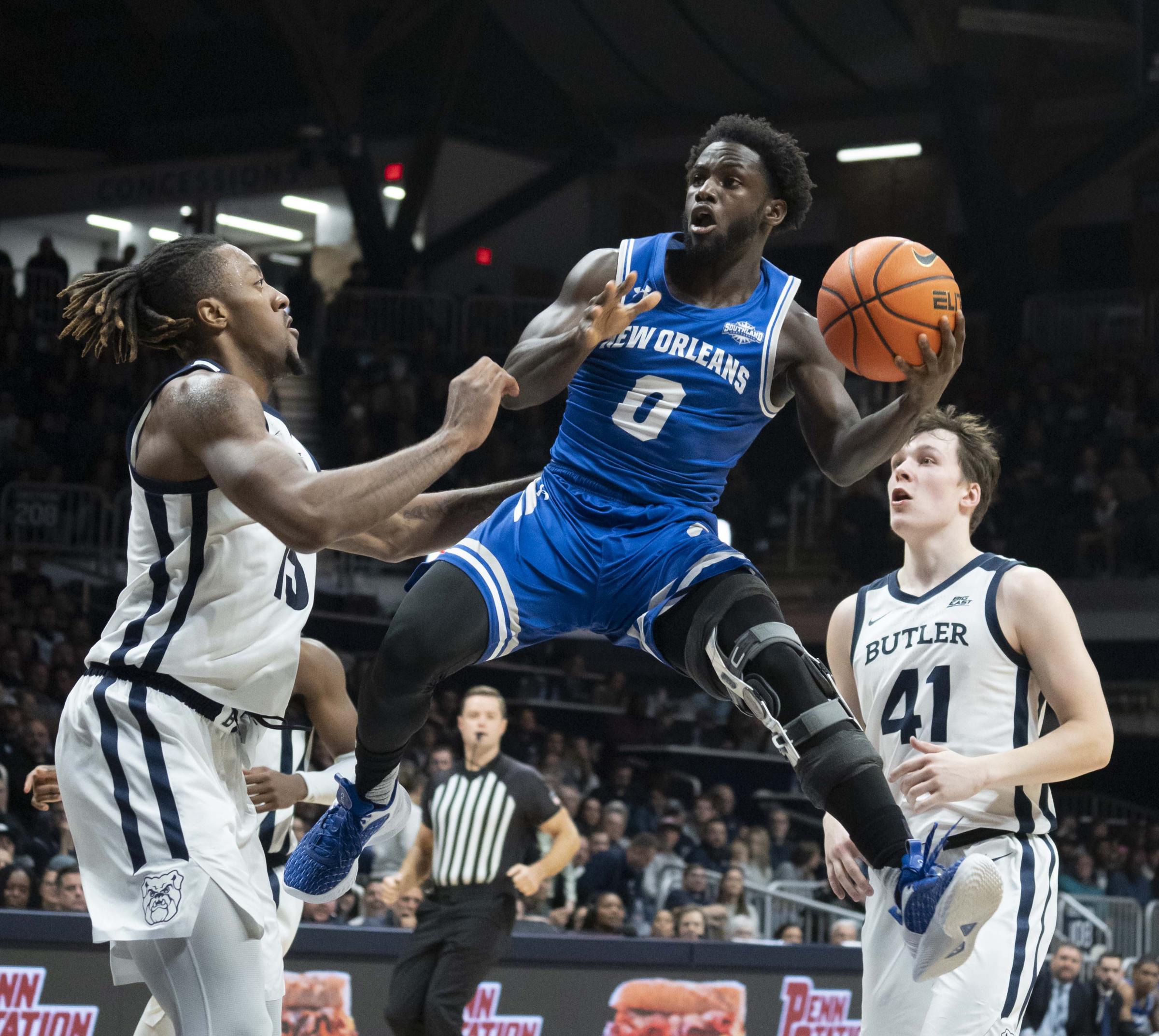 Sports - New Orleans Privateers guard Daniel Sackey (0) maneuvers...