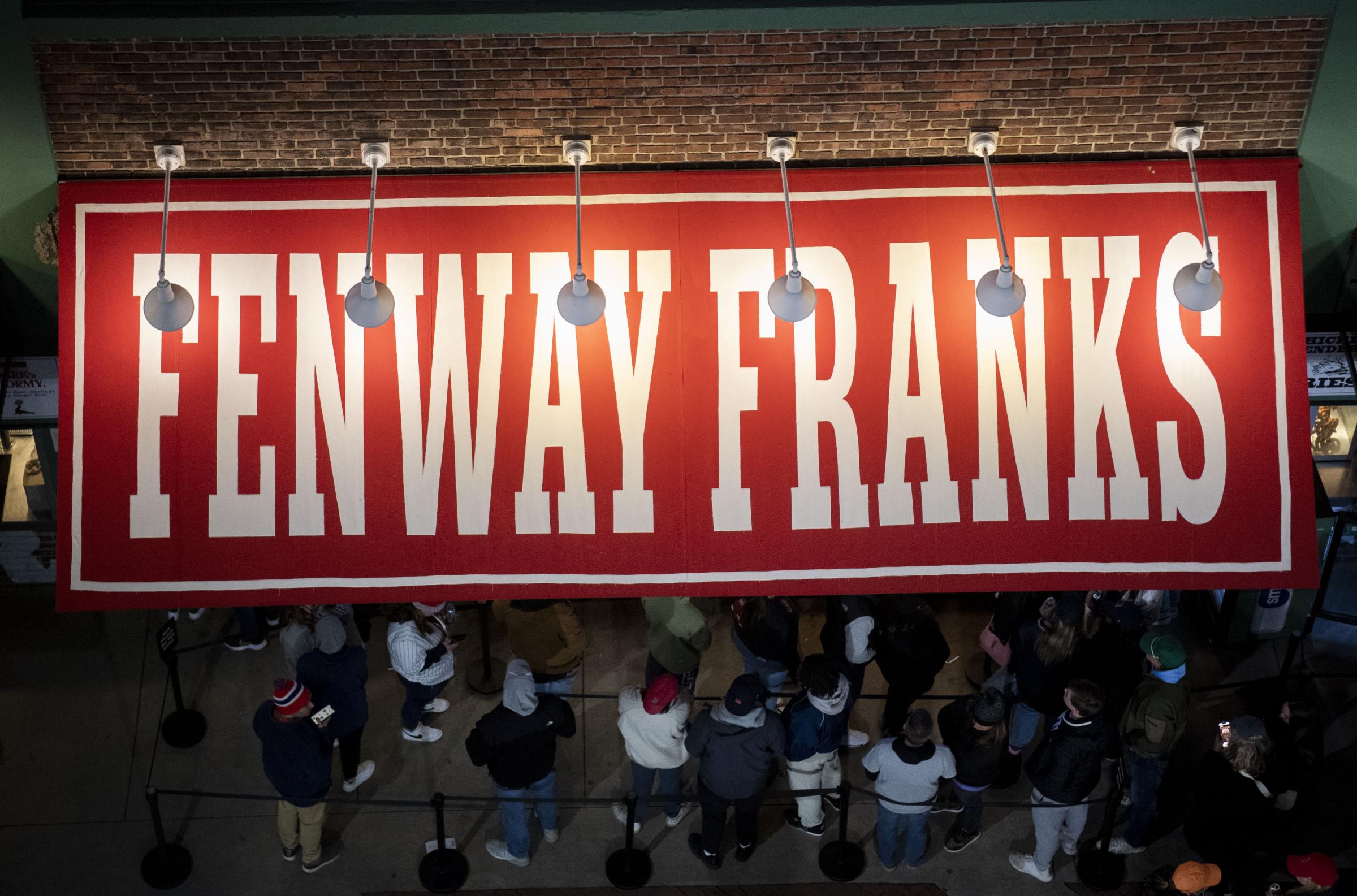 The 2023 Boston Red Sox  - April 3, 2023, Boston, MA: Fans order Fenway Franks...