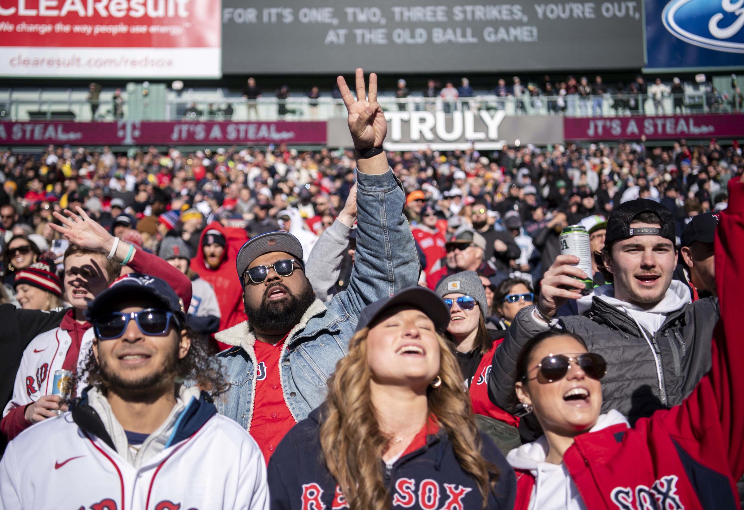 The 2023 Boston Red Sox  - March 30, 2023, Boston, MA:Red Sox fans sing “Take Me...