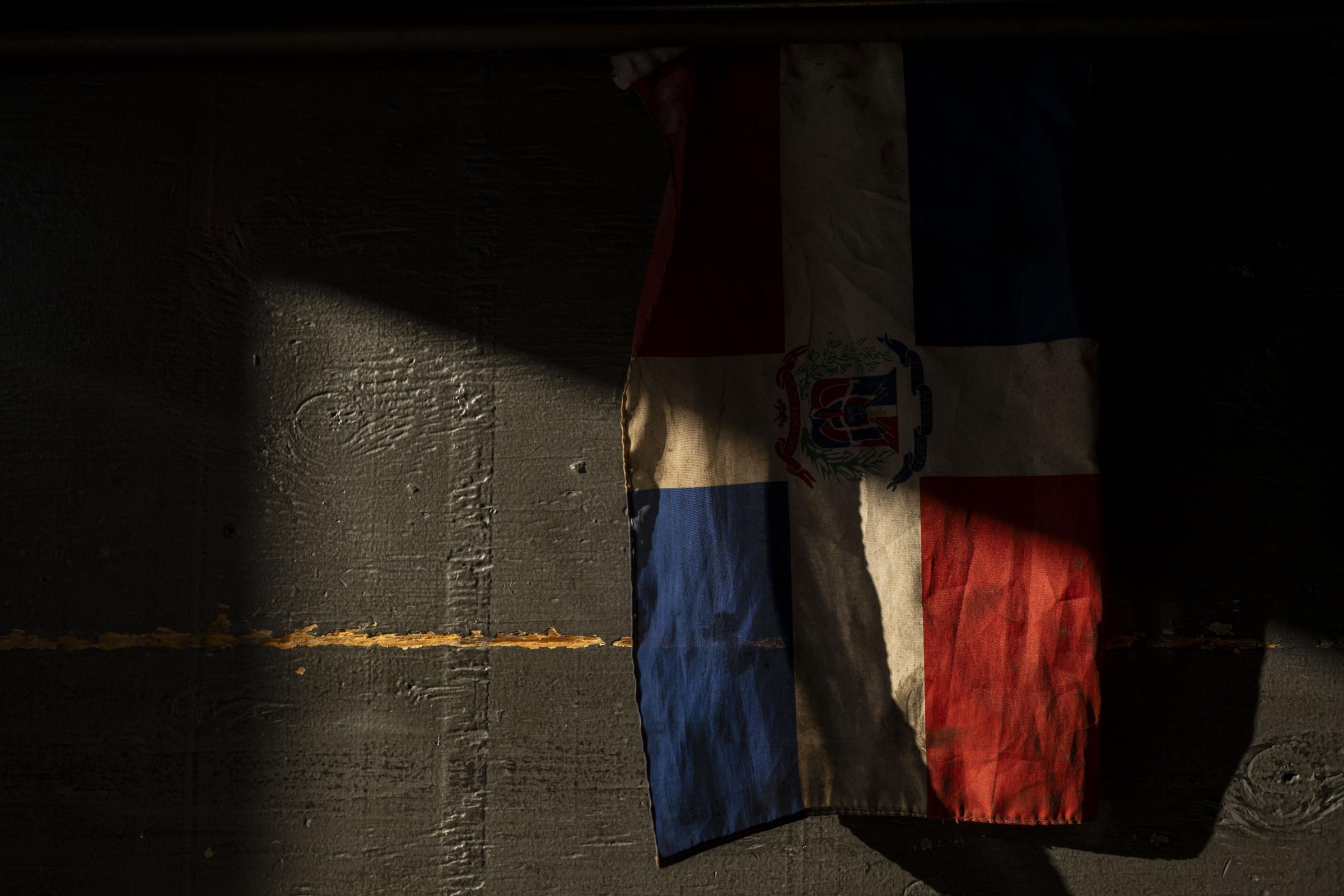 Livelihood  - August 23, 2023, Boston, MA:A Dominican flag hangs in...