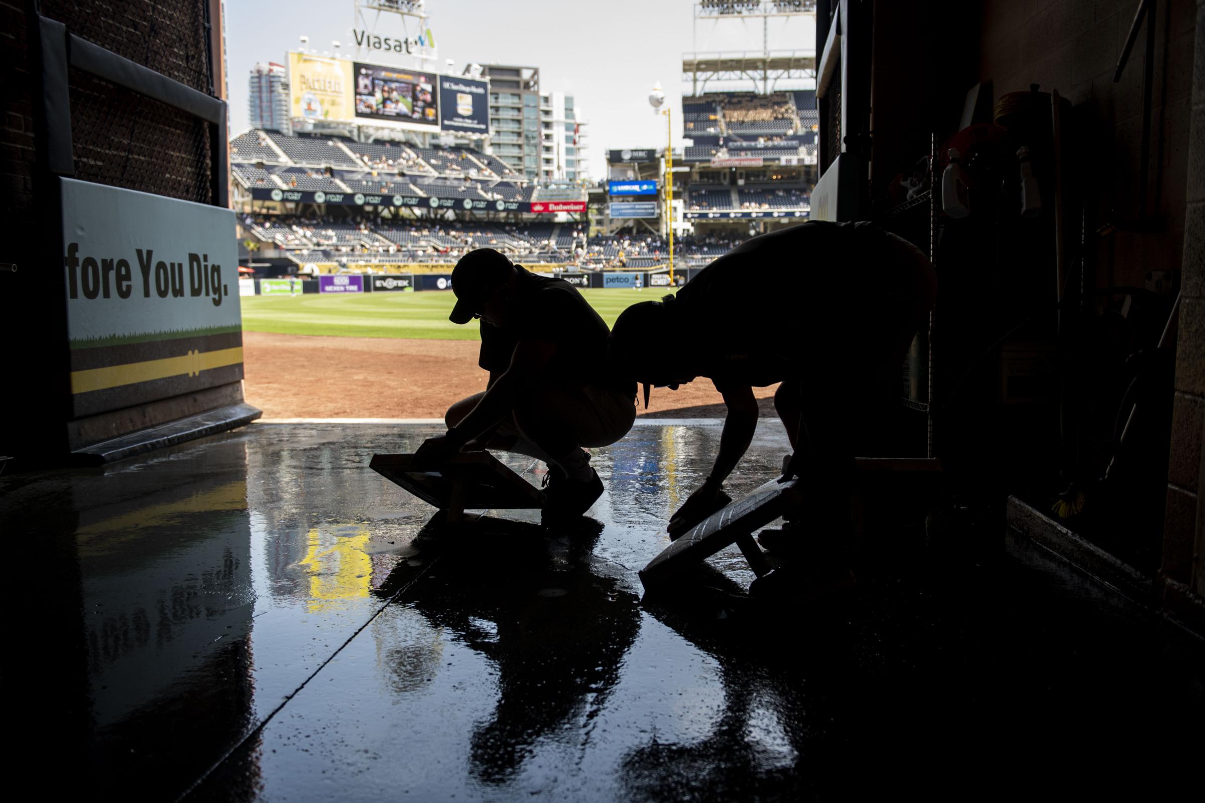 The 2024 San Diego Padres - SAN DIEGO, CALIFORNIA - APRIL 21: 
Grounds crew clean the...
