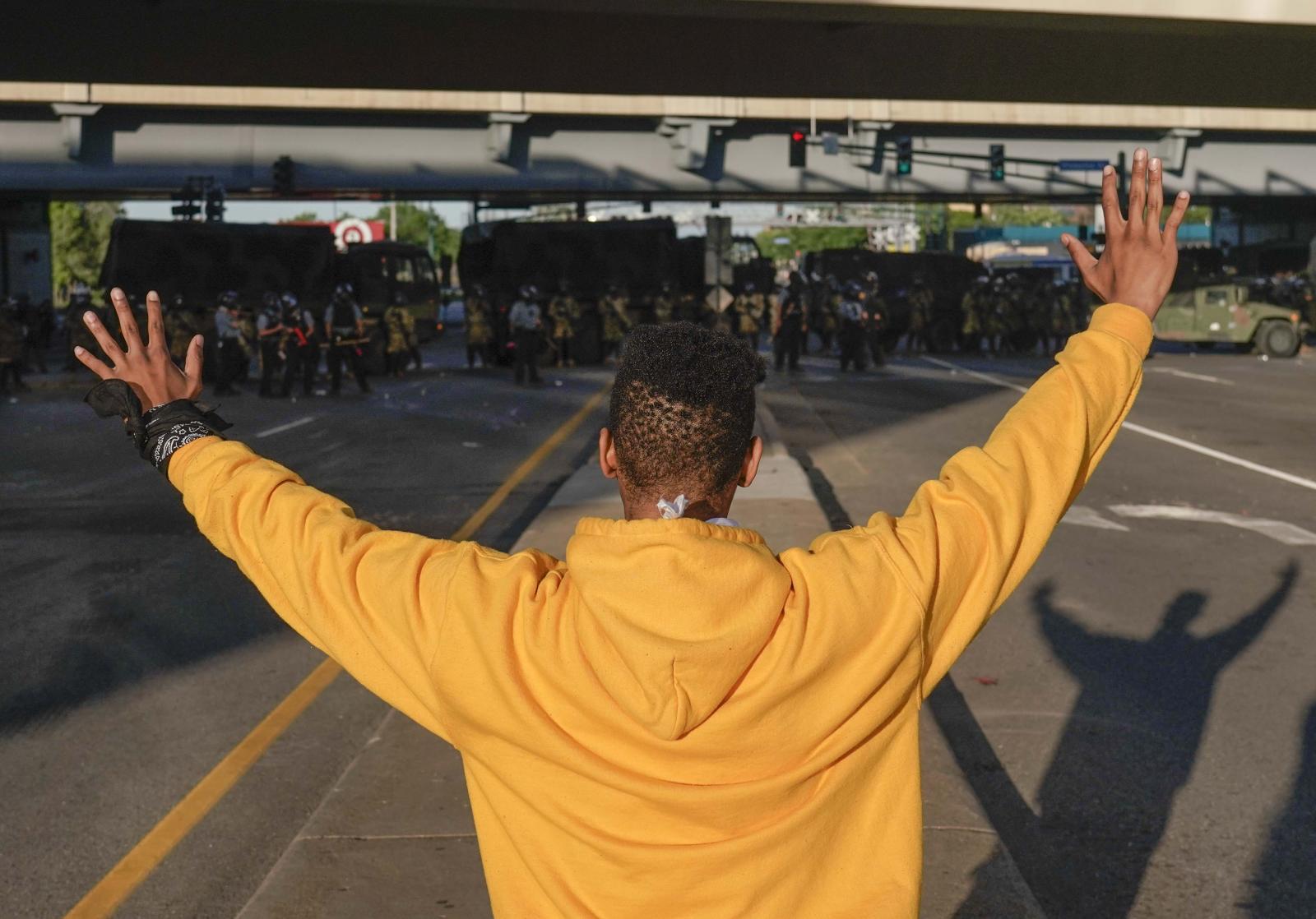 A protester holds his hands up ..., May 29, 2020, in Minneapolis.