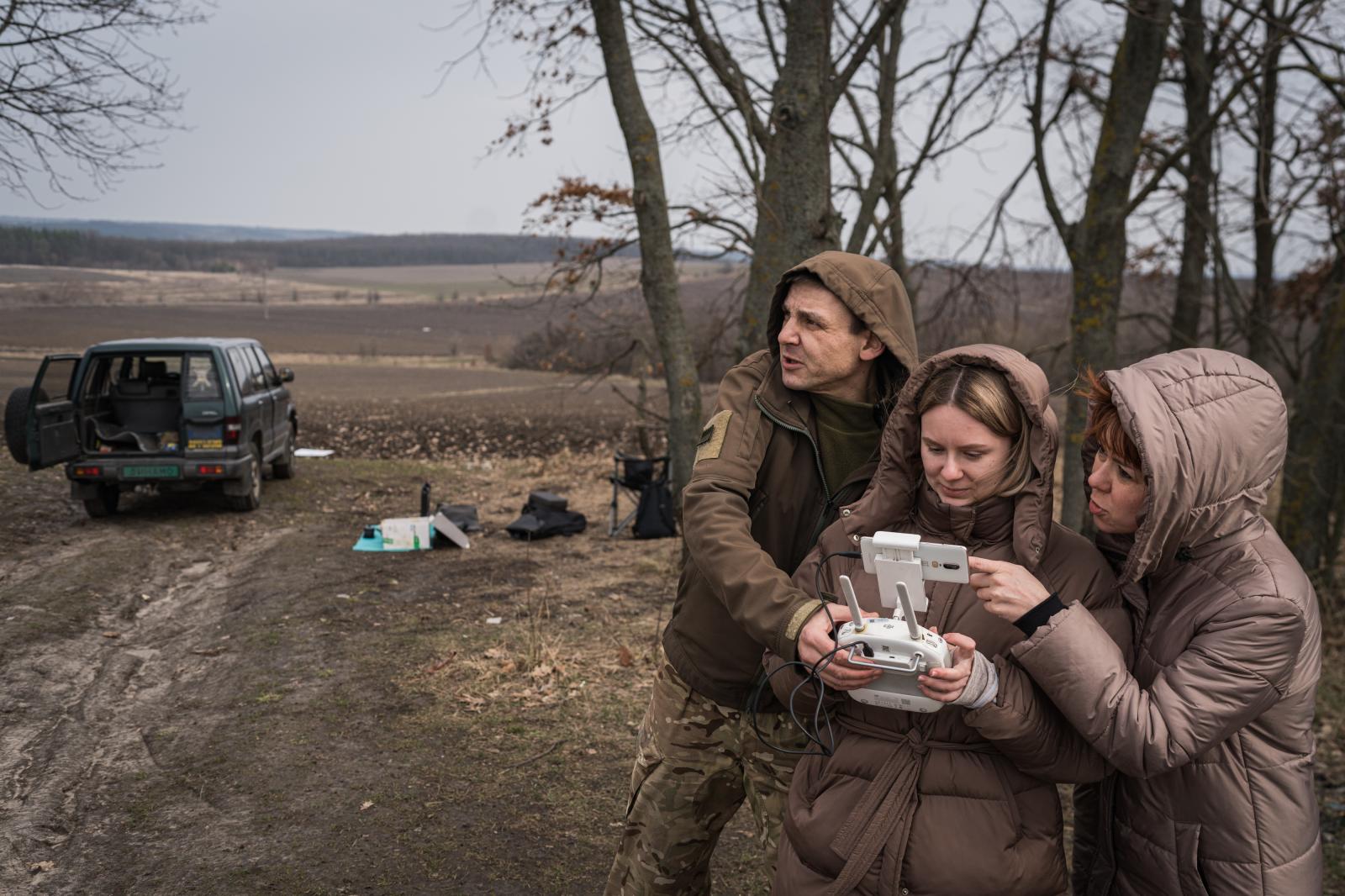 Ukraine: Second year of war - KYIV, UKRAINE - MARCH 23: Two course attendees prepare to pilot drones equipped with software...