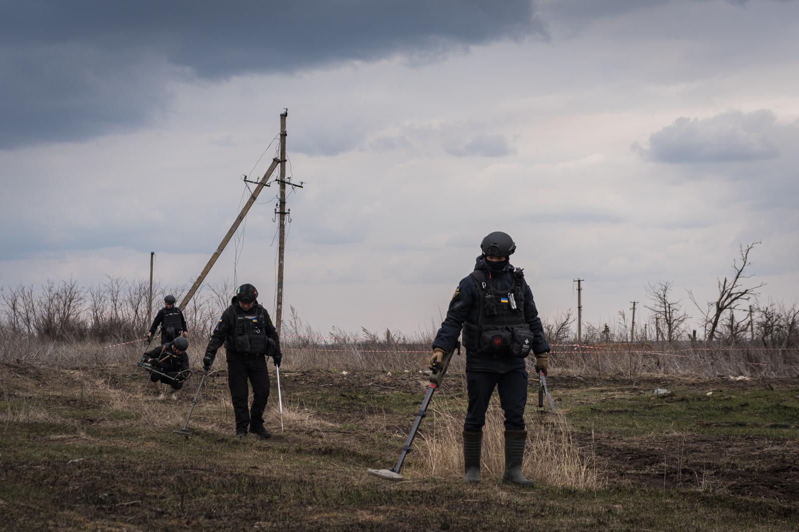 Ukraine: Second year of war - SULYHIVKA, UKRAINE - MARCH 26: Emergency demining team carries out demining and destruction of...