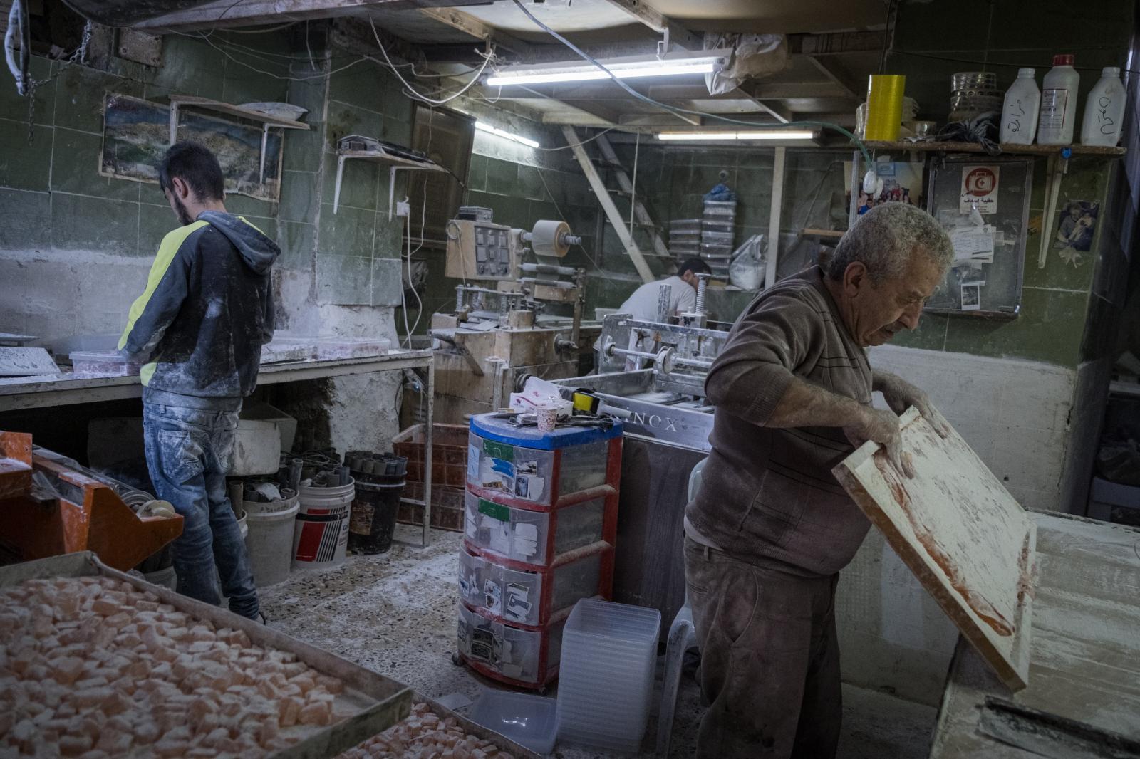 Israel, an announced war - Workers in the city of Nablus, Palestine. The entire region has been affected by the closure of...