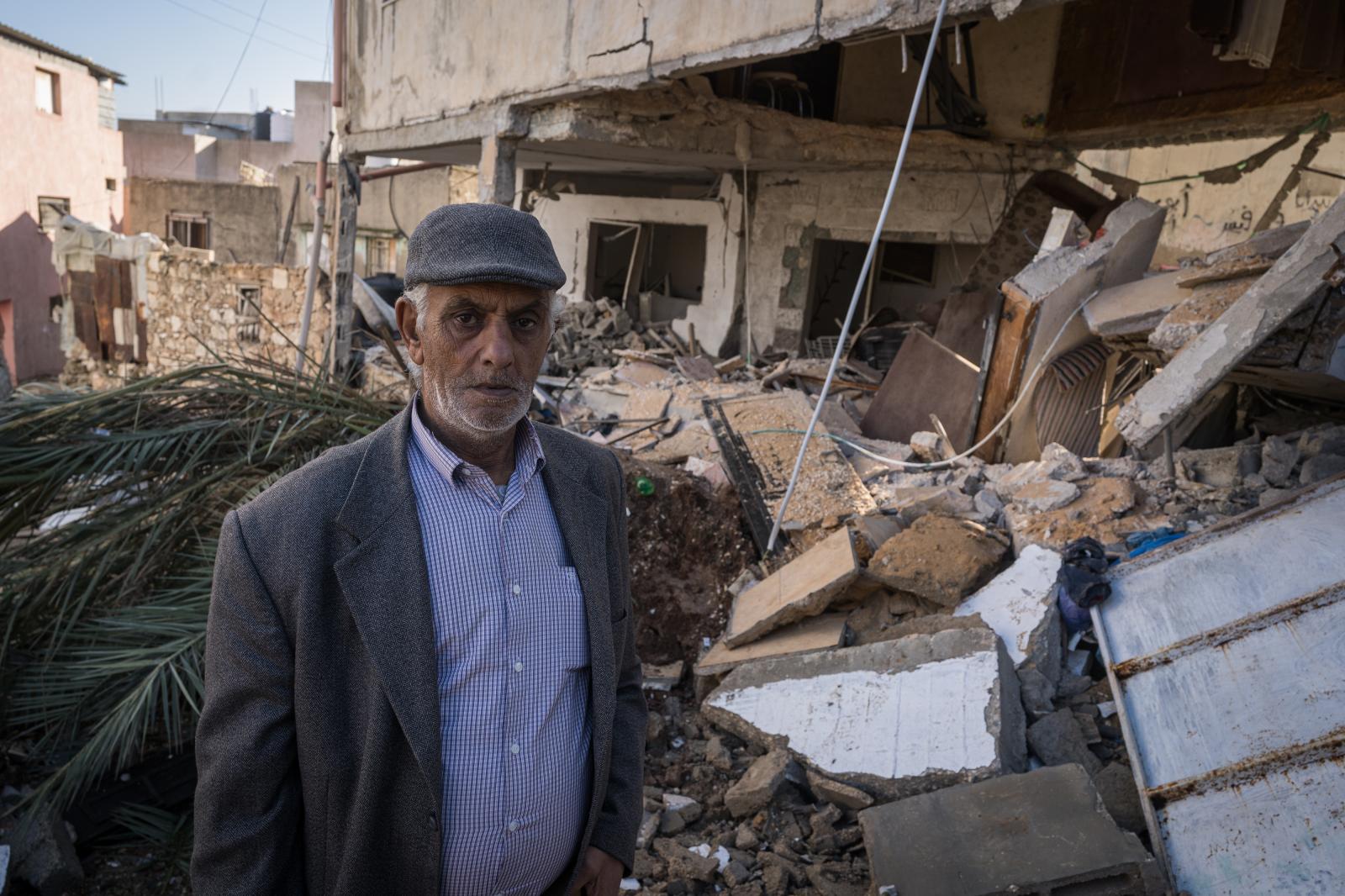 Israel, an announced war - JENIN, PALESTINE - DECEMBER 25: Sobhi poses for a portrait in front of his neighbor Naser's...