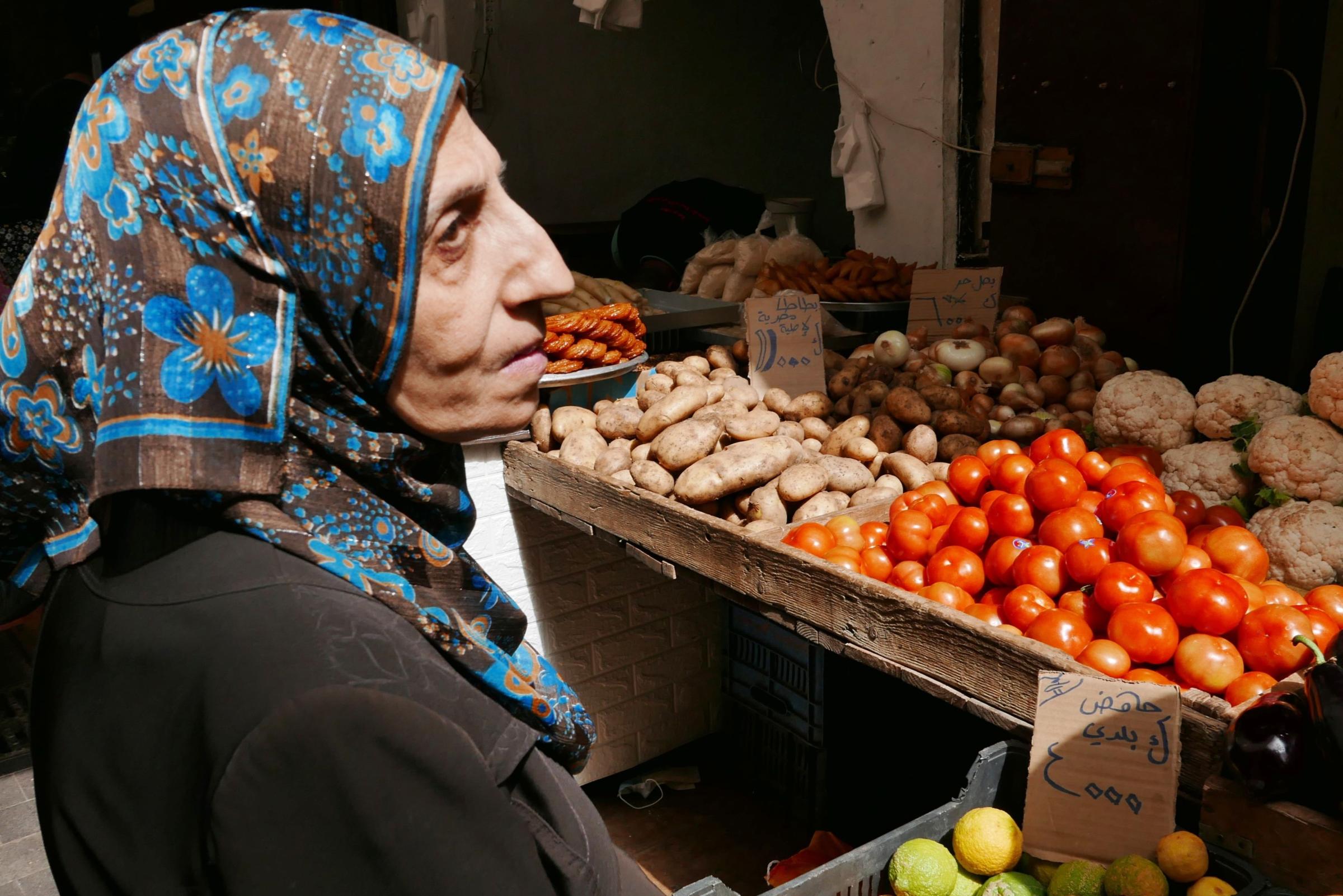 Libano - Lebanon - A woman buys vegetables in Tripoli's souk, Lebanon, April...