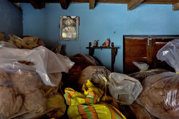 Image from How Peru Saved the Vicuñas - Peru, Lucanas, 2022/09/12. A storage room is filled with...