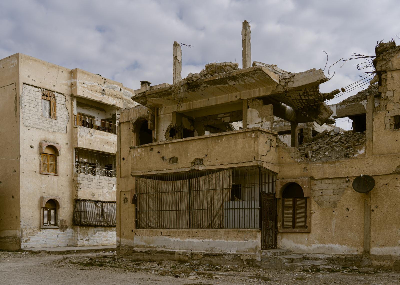 Bombed houses in the &quot;...uses are inhabited again today.