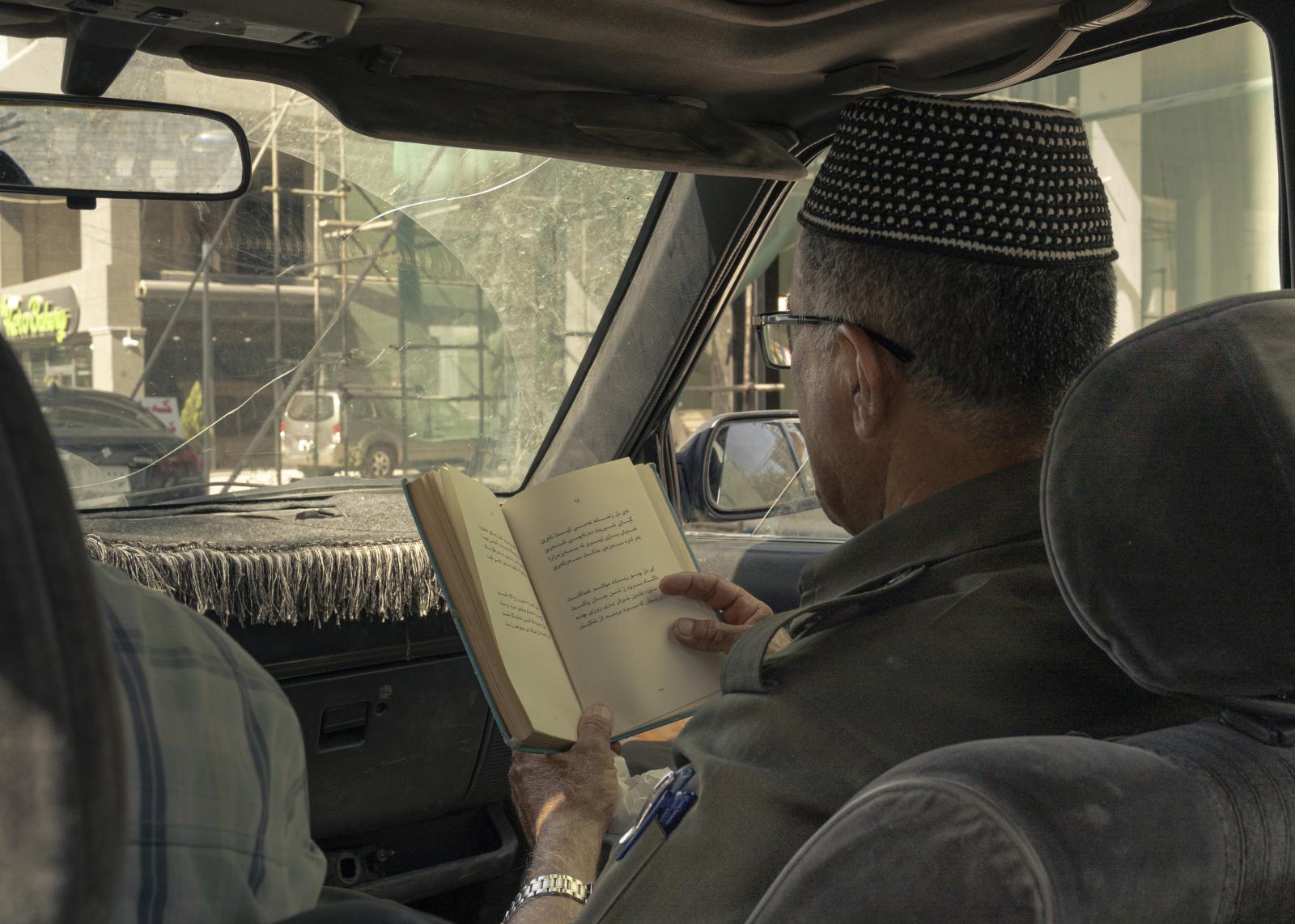 Hazar Jaf, an elderly Kurd, rea...e driving through Sulaymaniyah.