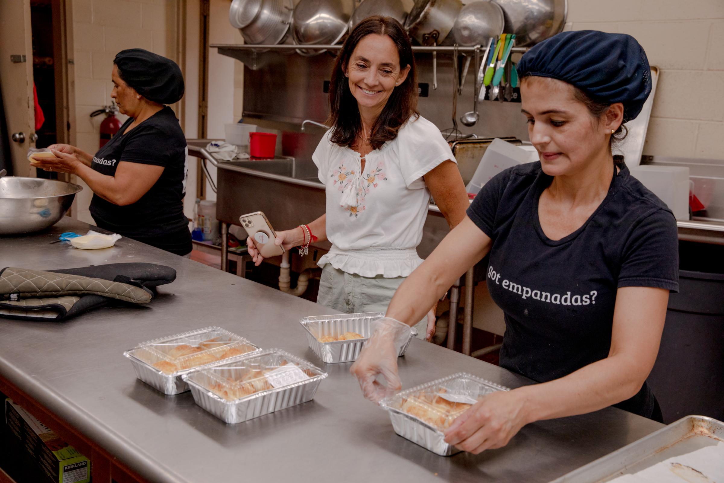 Recent Assignment - Jackie Mendive, center, started her business Empanadas On...