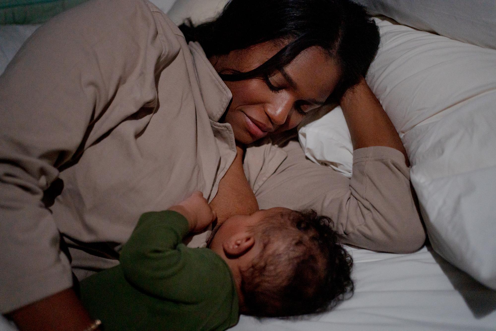 Recent Assignment - Aleigha Harris breastfeeding her four-month-old son,...